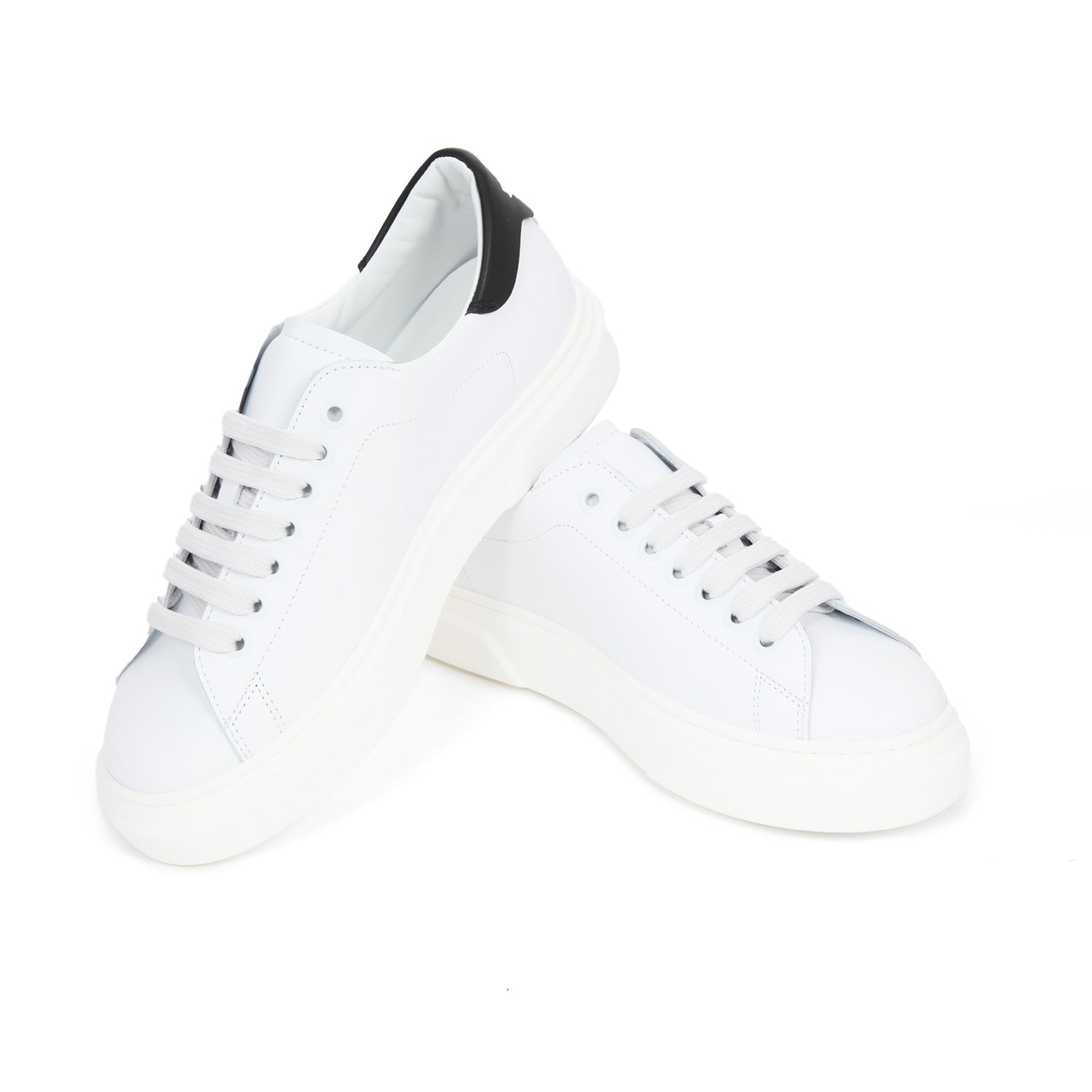 SNEAKER UNISEX BIANCA E NERA TEENAGER - annameglio.com abbigliamento moda
