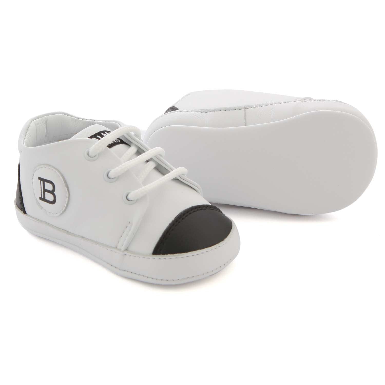 MINI SNEAKERS BIANCHE E NERE IN PELLE NEONATA - annameglio.com abbigliamento moda