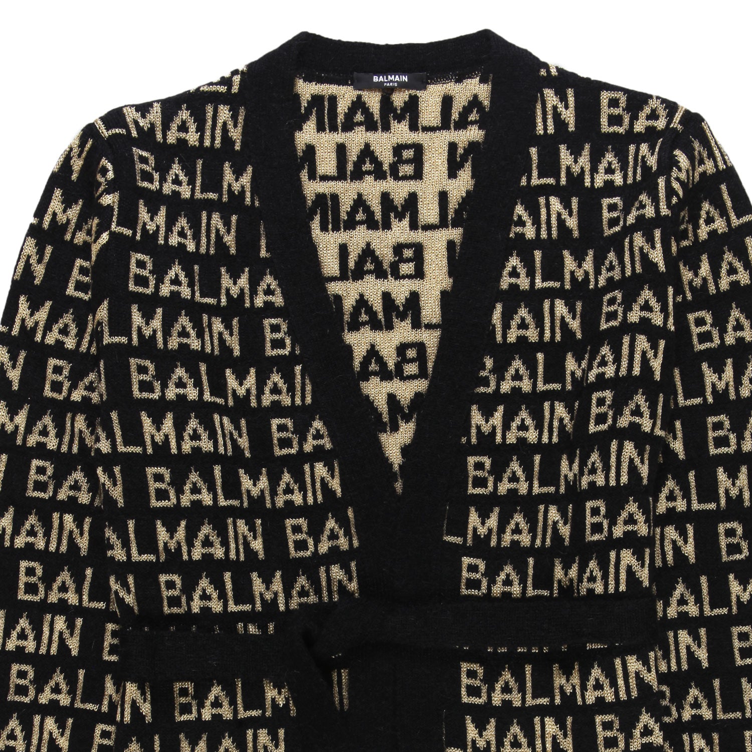 Cardigan over nero con loghi Balmain oro - annameglio.com abbigliamento moda