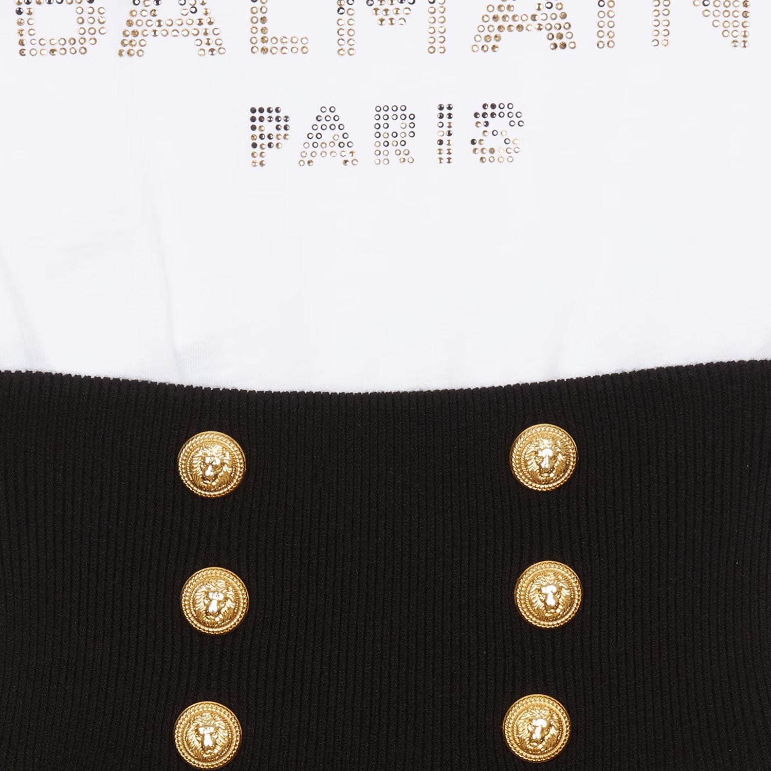 Abito Balmain bianco e nero con logo strass - annameglio.com abbigliamento moda