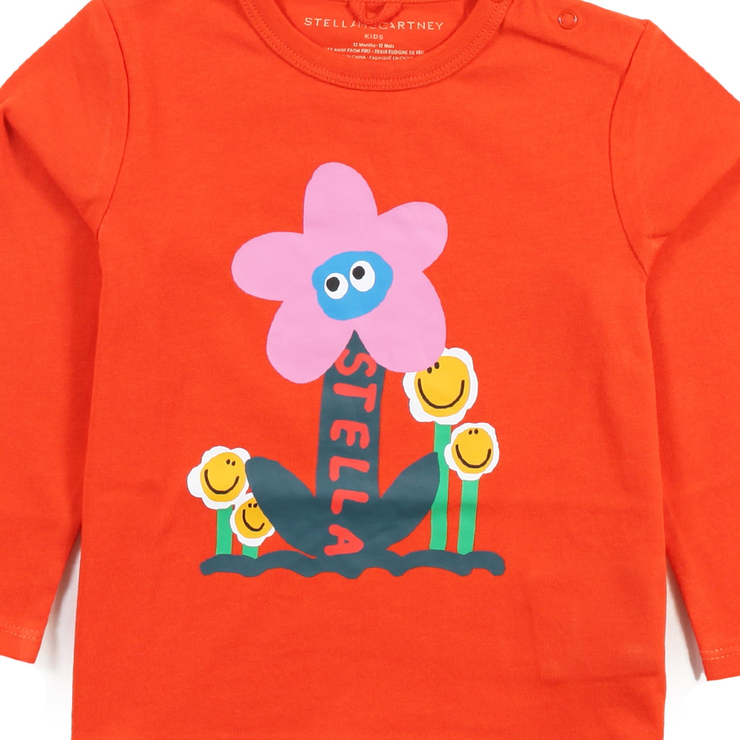 T-shirt Stella arancio con fiori multicolor bimba - annameglio.com abbigliamento moda