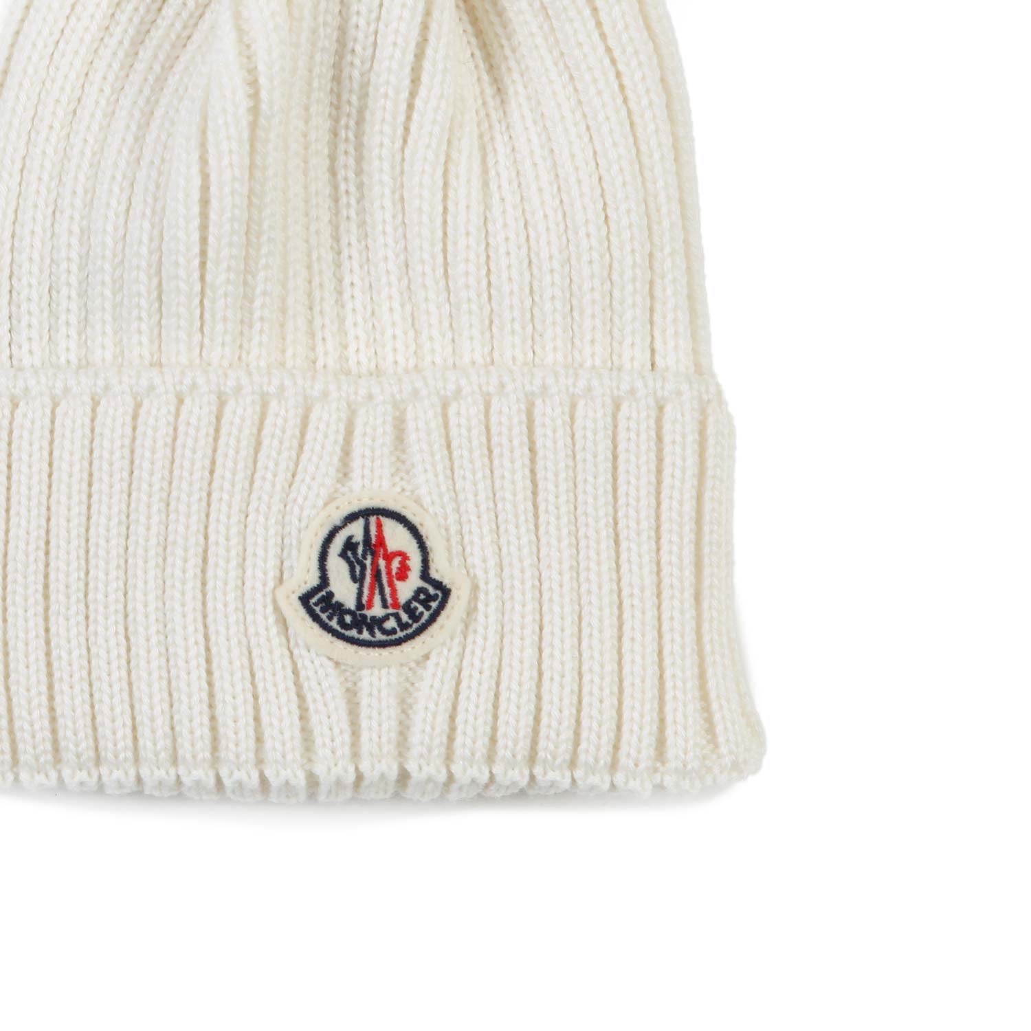 Berretto Moncler Girl bianco con pon pon - annameglio.com abbigliamento moda