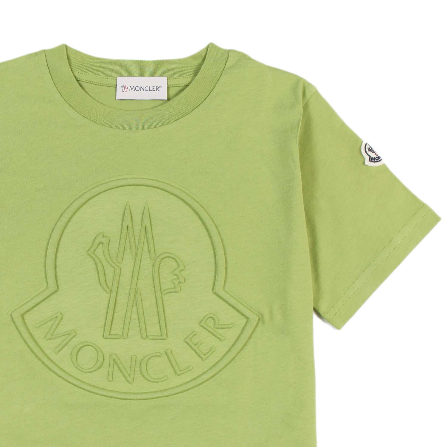 T-shirt Moncler verde chiaro con logo goffrato - annameglio.com abbigliamento moda