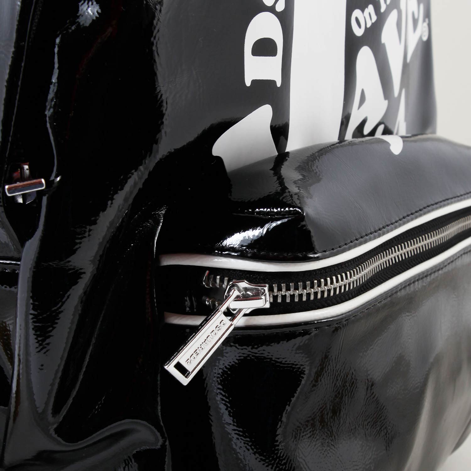 zaino lucido con grafica wave 1964 - annameglio.com abbigliamento moda