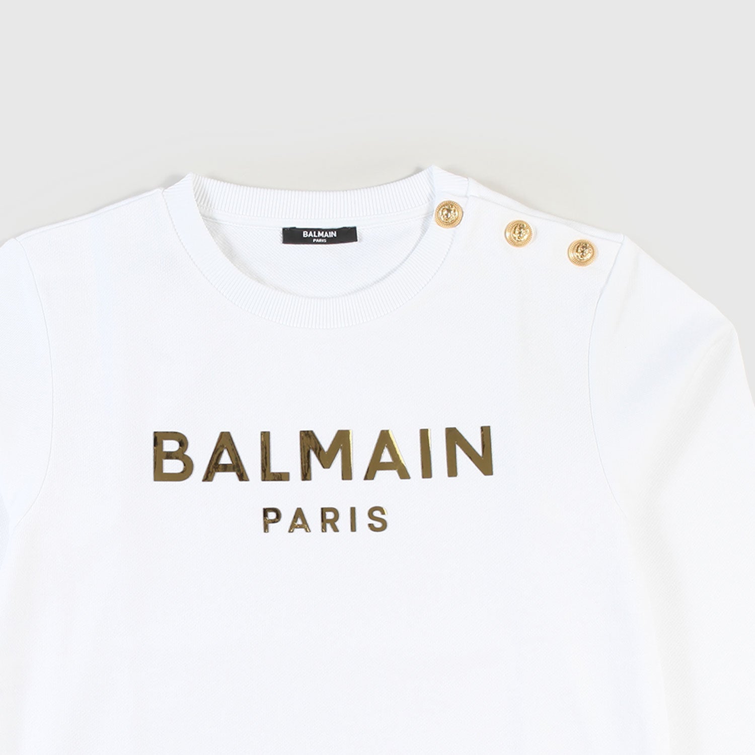 Felpa bianca con bottoni e stampa ragazza - annameglio.com abbigliamento moda