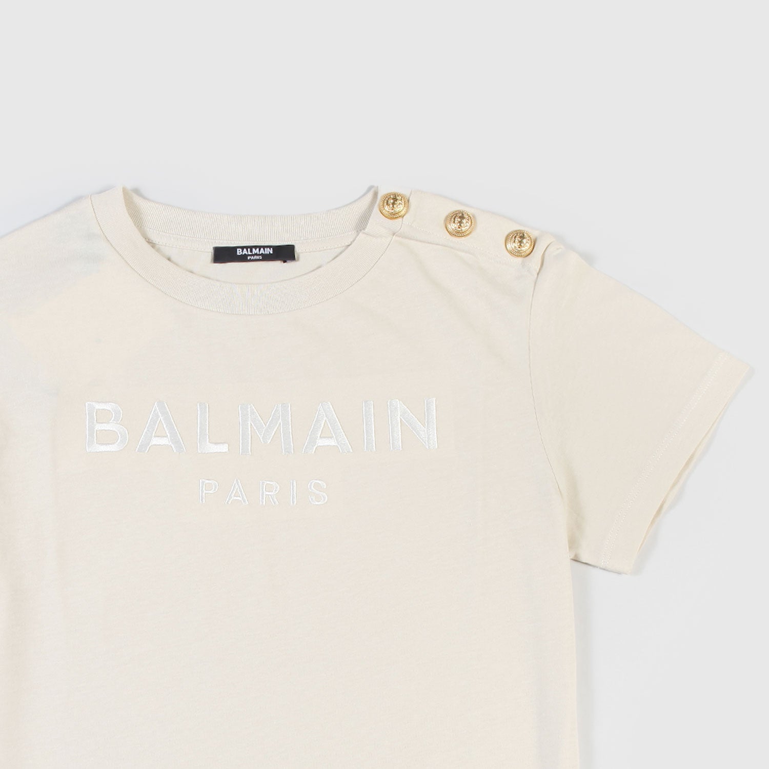 T-shirt beige con bottoni ragazza - annameglio.com abbigliamento moda