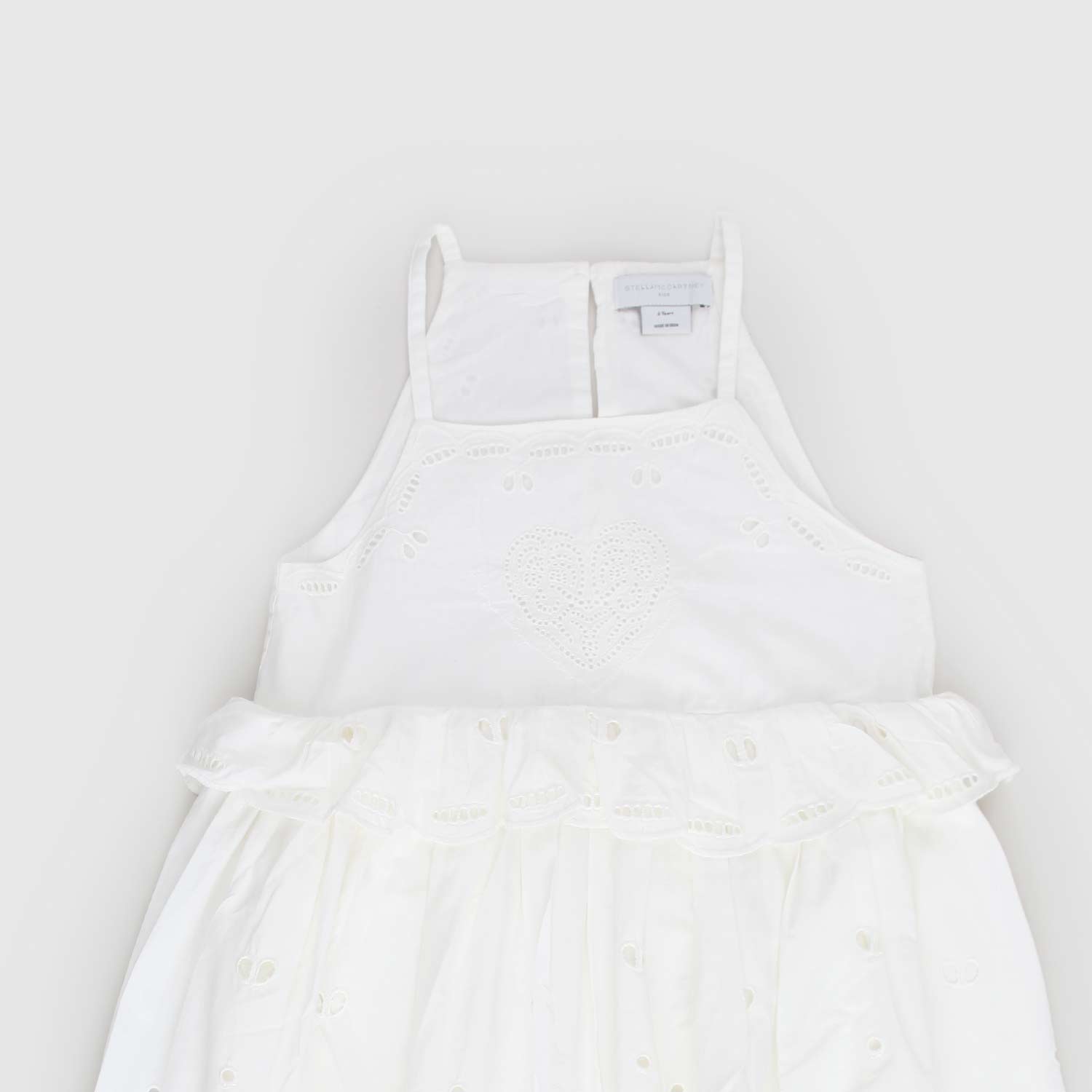 Abito bianco smanicato con ricami a punto inglese - annameglio.com abbigliamento moda