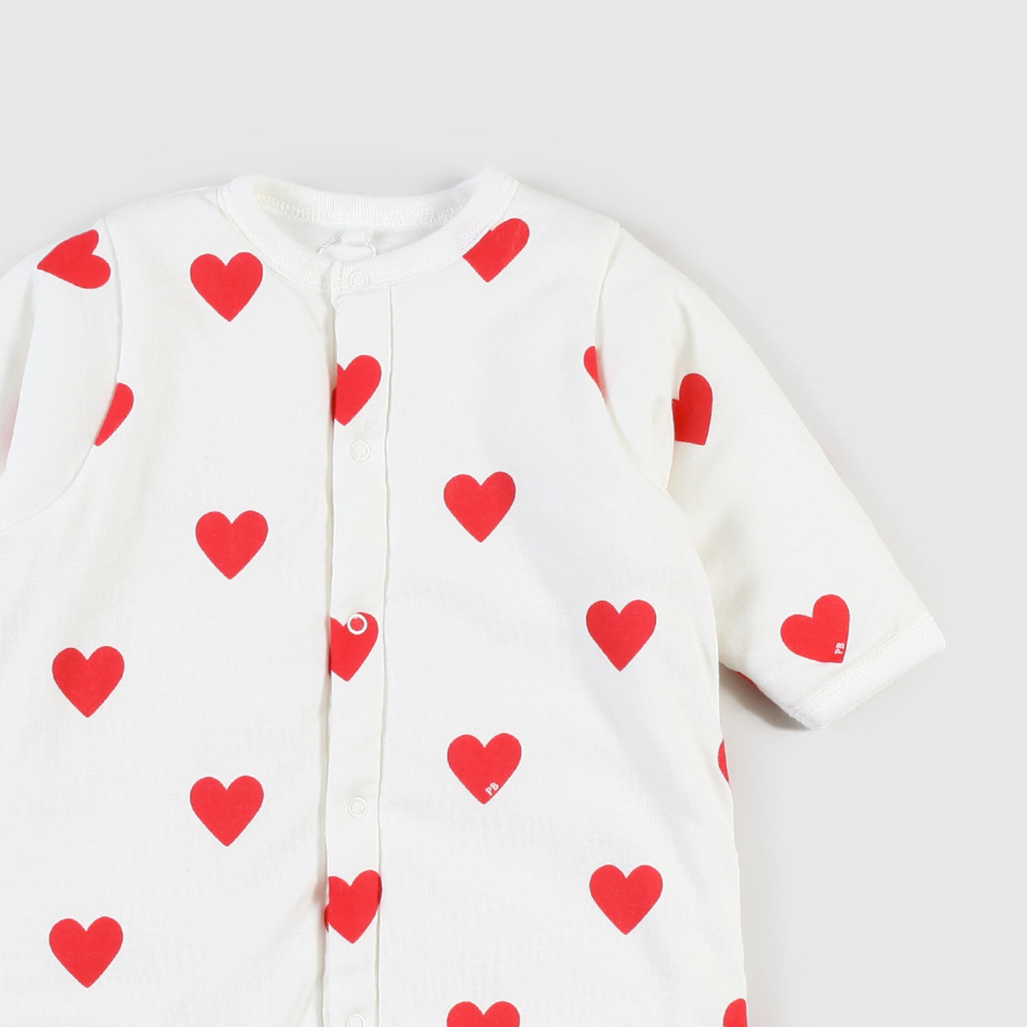 pigiama bianco con fantasia a cuori bebè - annameglio.com abbigliamento moda