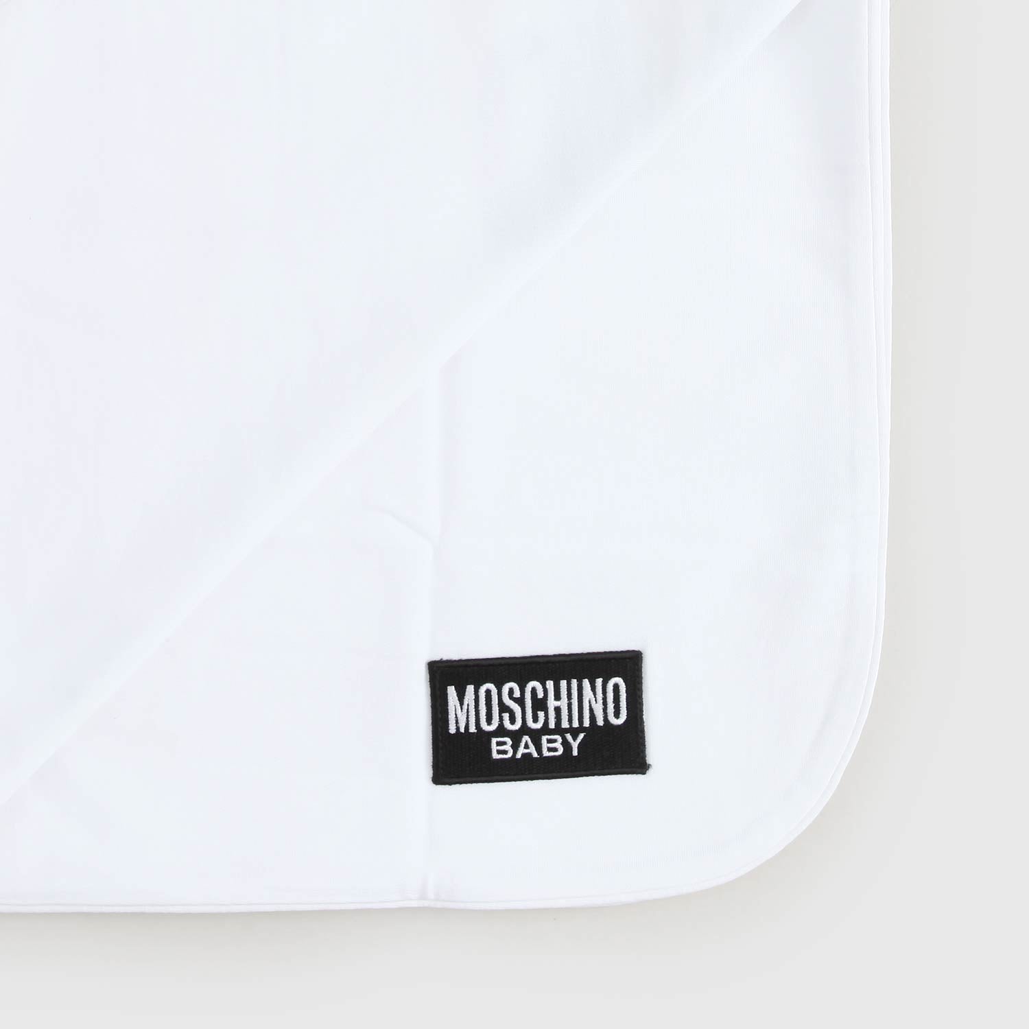 Copertina Bianca Teddy Bear Moschino - annameglio.com abbigliamento moda