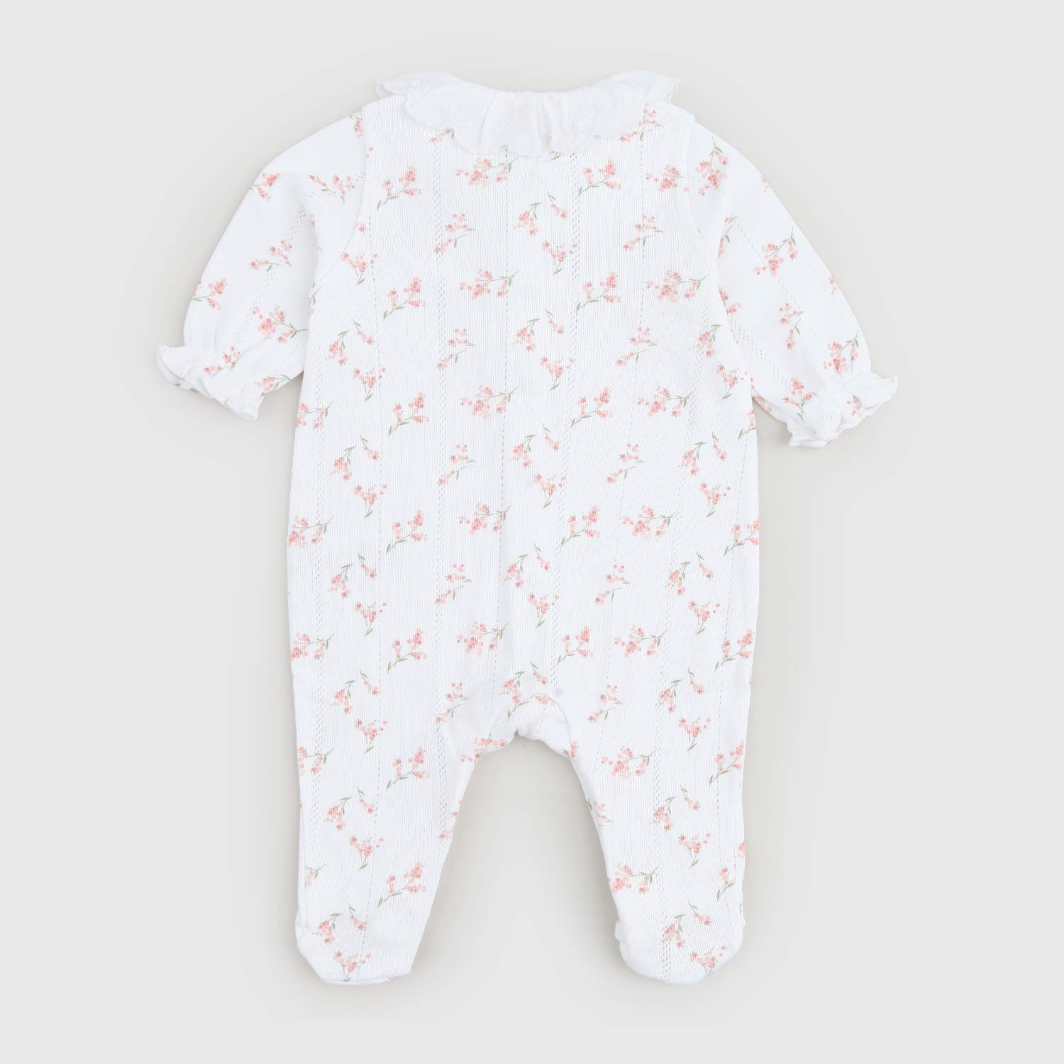 Tutina bianca per neonata con stampe a fiori - annameglio.com abbigliamento moda