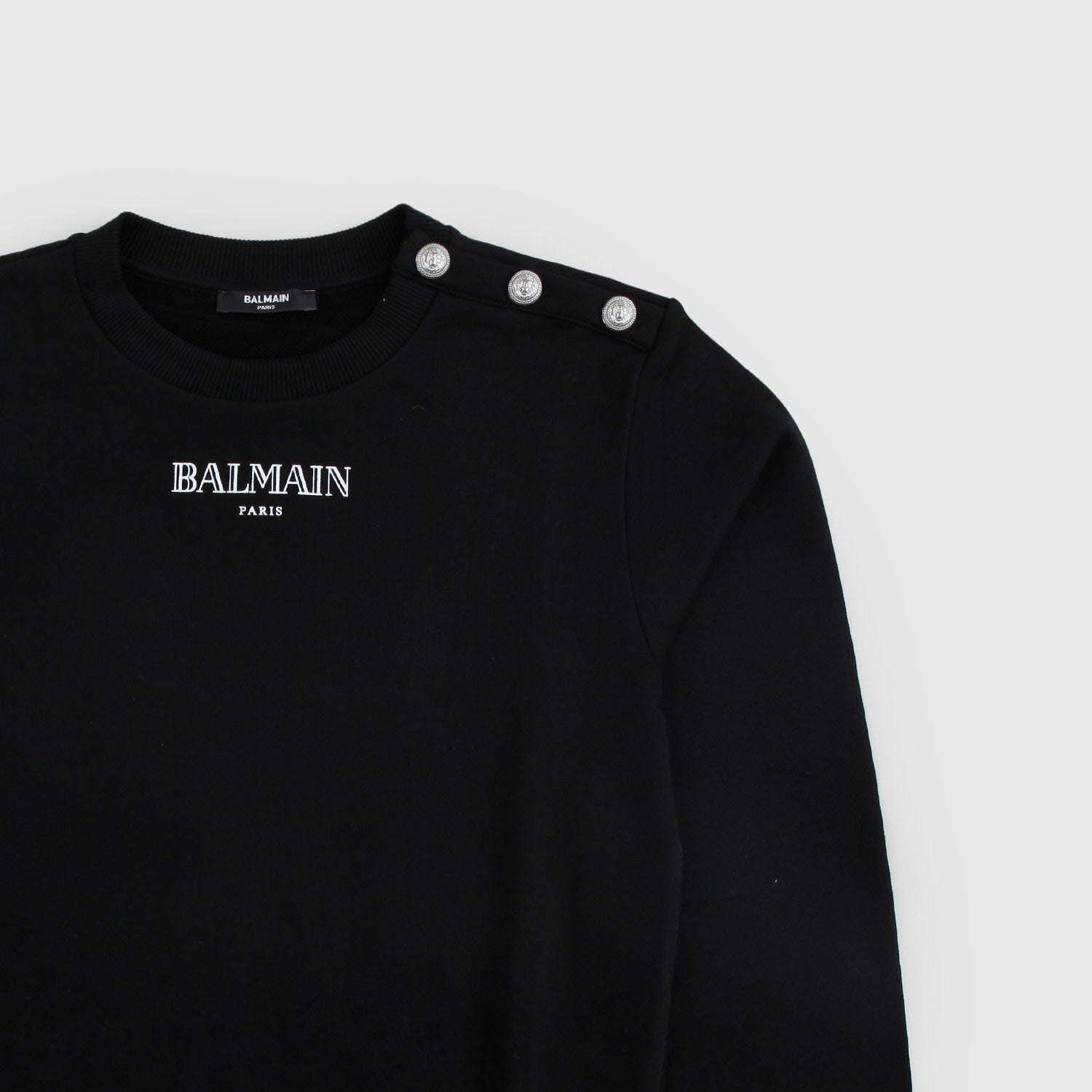 Felpa lunga nera con logo e bottoni - annameglio.com abbigliamento moda