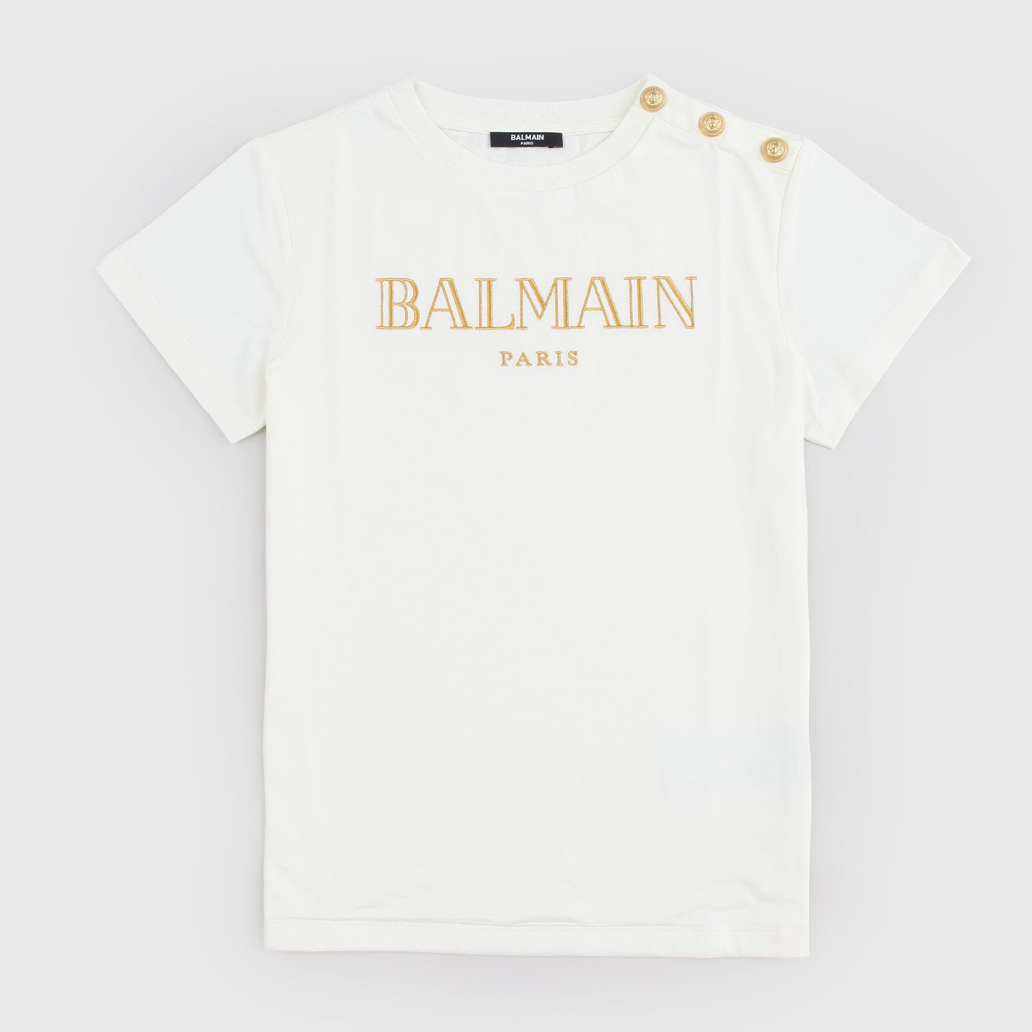 T-shirt beige con logo e bottoncini d’oro - annameglio.com abbigliamento moda