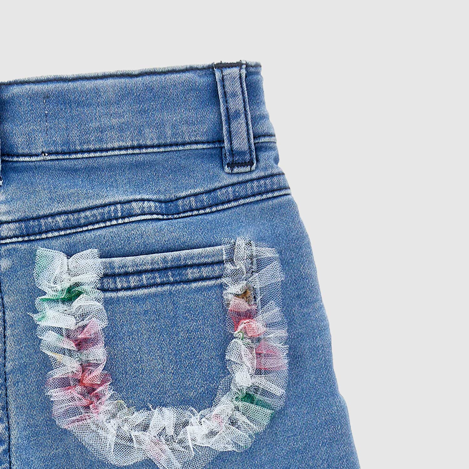 Pantaloni denim ricamato con galette - annameglio.com abbigliamento moda