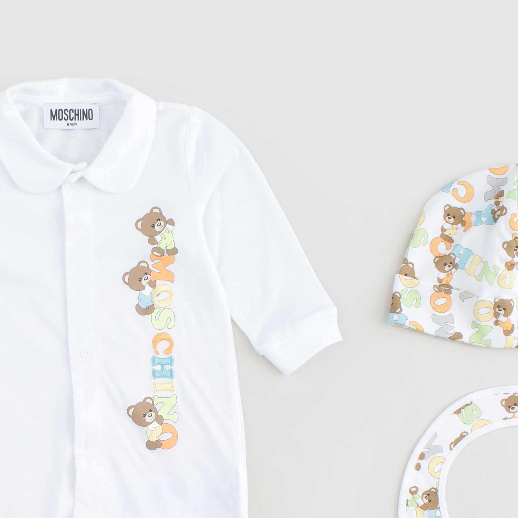 Tutina Bianca Firmata MOSCHINO - annameglio.com abbigliamento moda