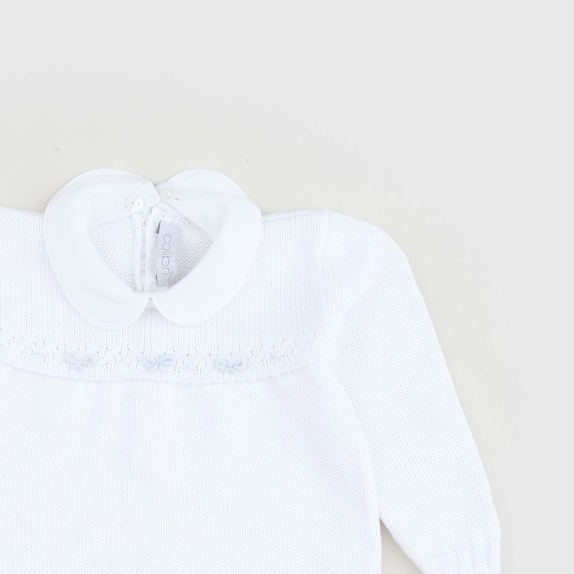 Tutina Bianca Con Ricami Celesti Firmata COLIBRI - annameglio.com abbigliamento moda