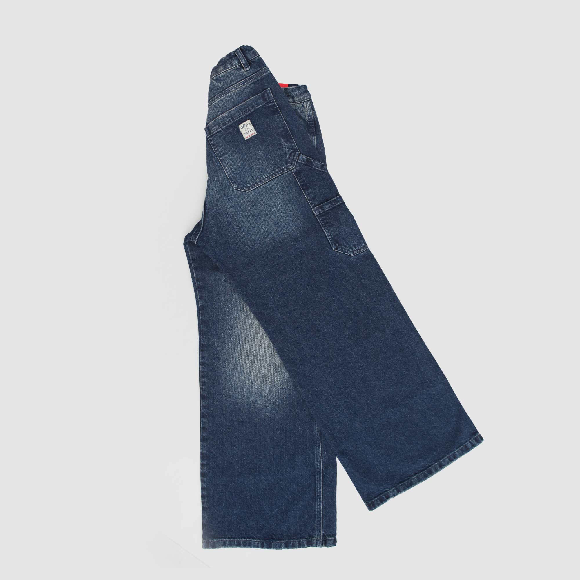 Jeans In Denim Blu Largo Firmata DIESEL - annameglio.com abbigliamento moda