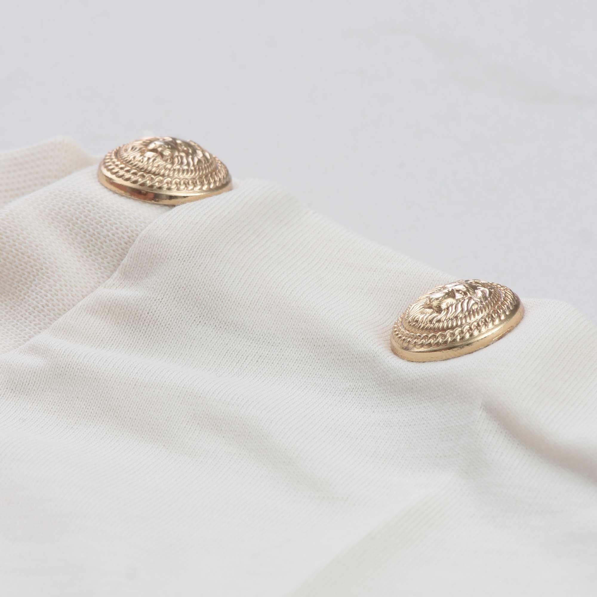 T-shirt Cipria Con Bottoni Oro Firmata BALMAIN - annameglio.com abbigliamento moda