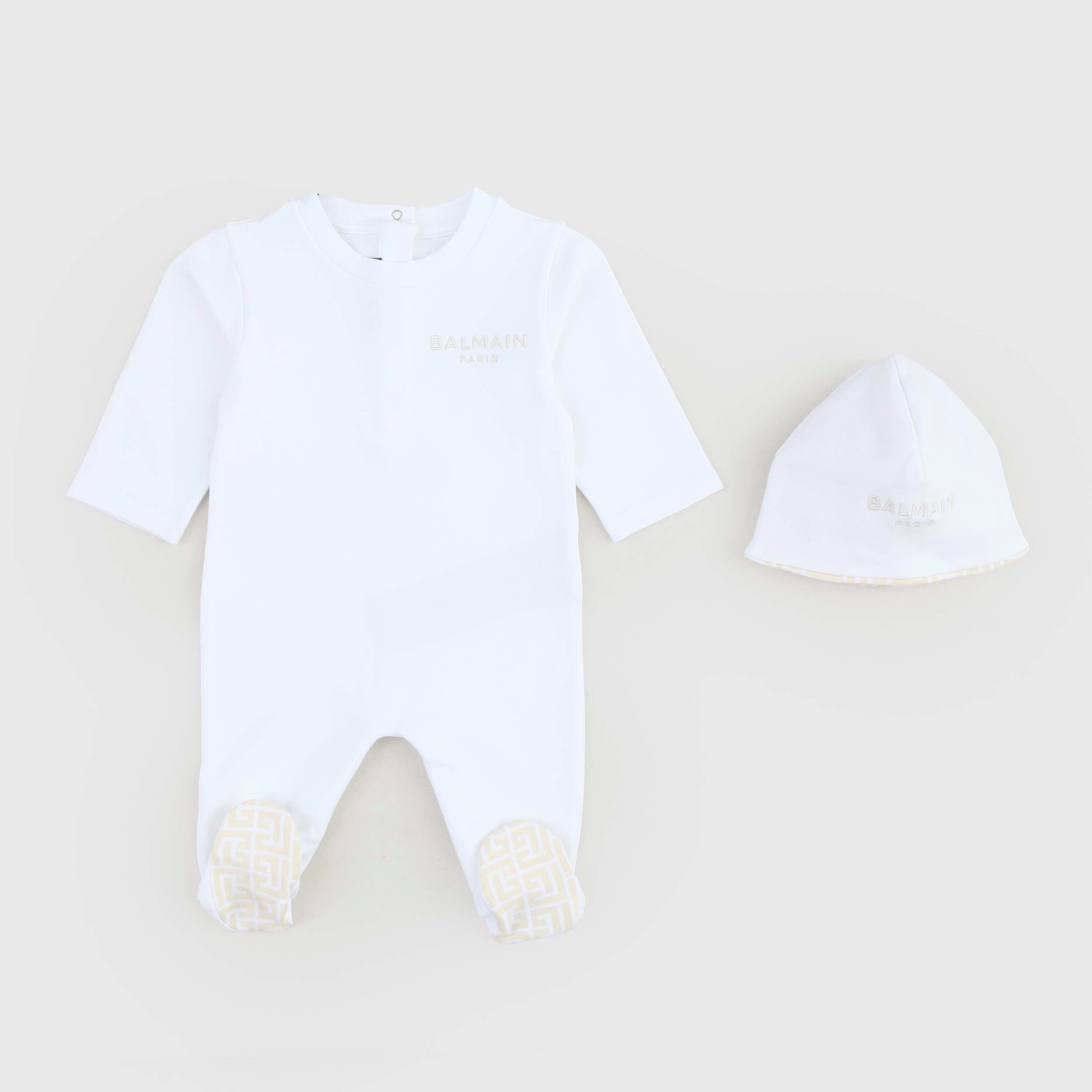 Tutina Bianca Con Cappellino Firmata BALMAIN - annameglio.com abbigliamento moda