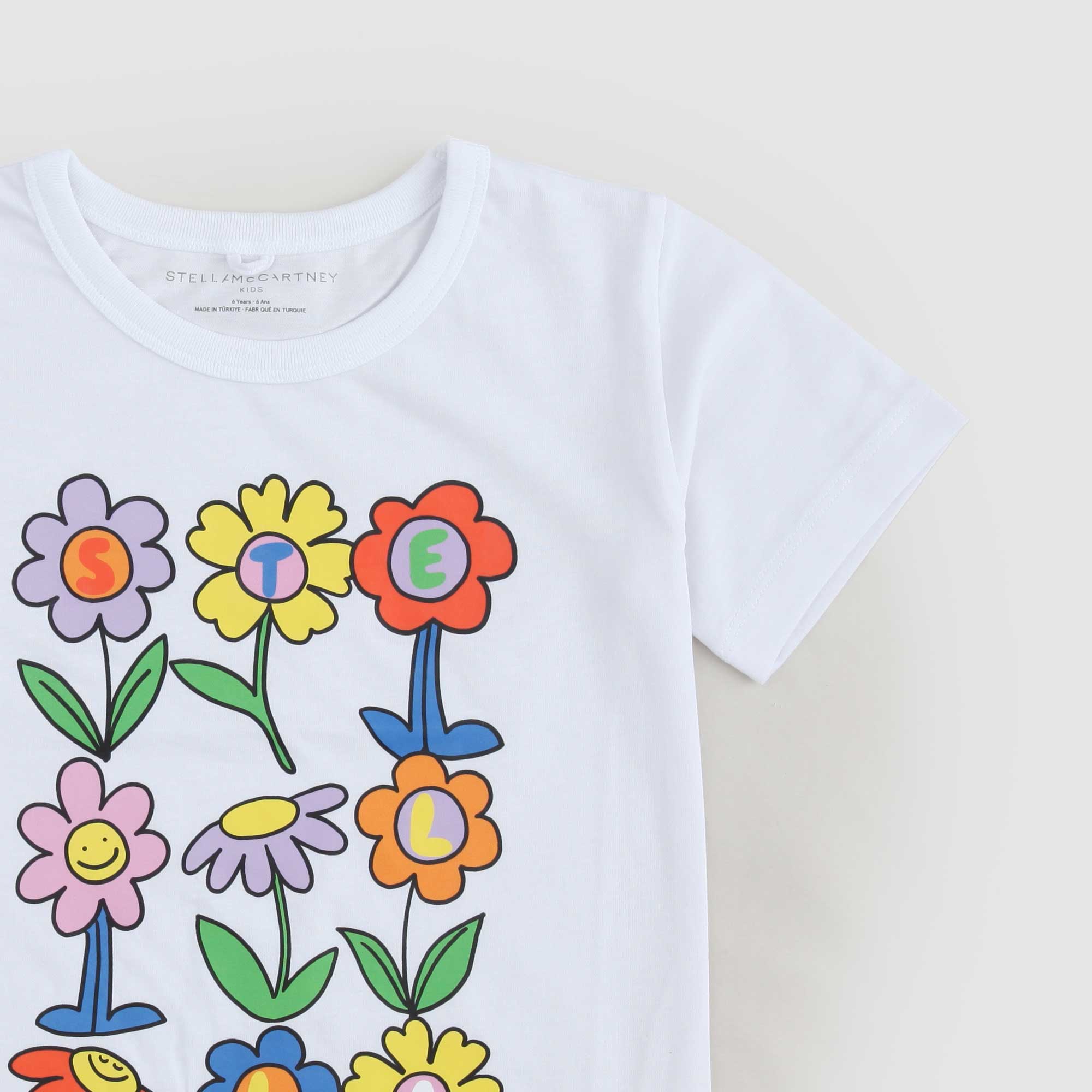 T-shirt Bianca Con Fiori Firmata STELLA MCCARTNEY - annameglio.com abbigliamento moda