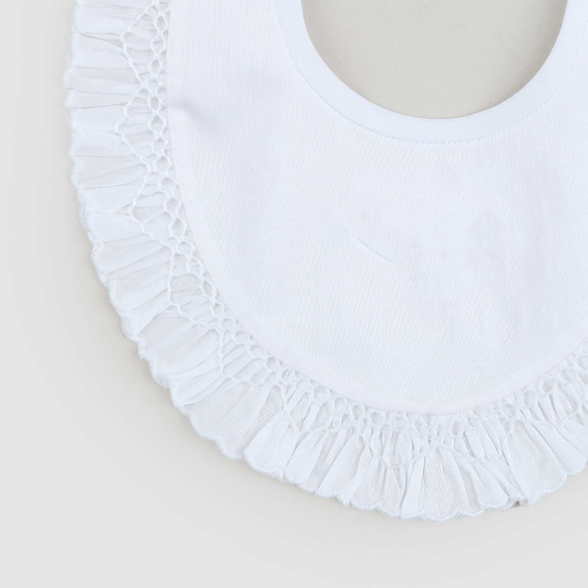 Bavaglino In Piquet Bianco Firmato BARONI - annameglio.com abbigliamento moda