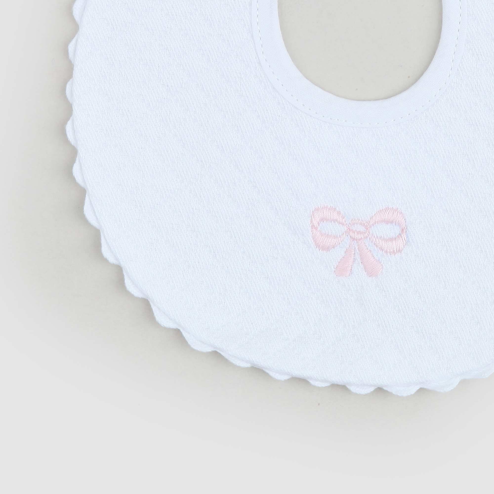 Bavaglino Con Fiocco Rosa Firmato BARONI - annameglio.com abbigliamento moda