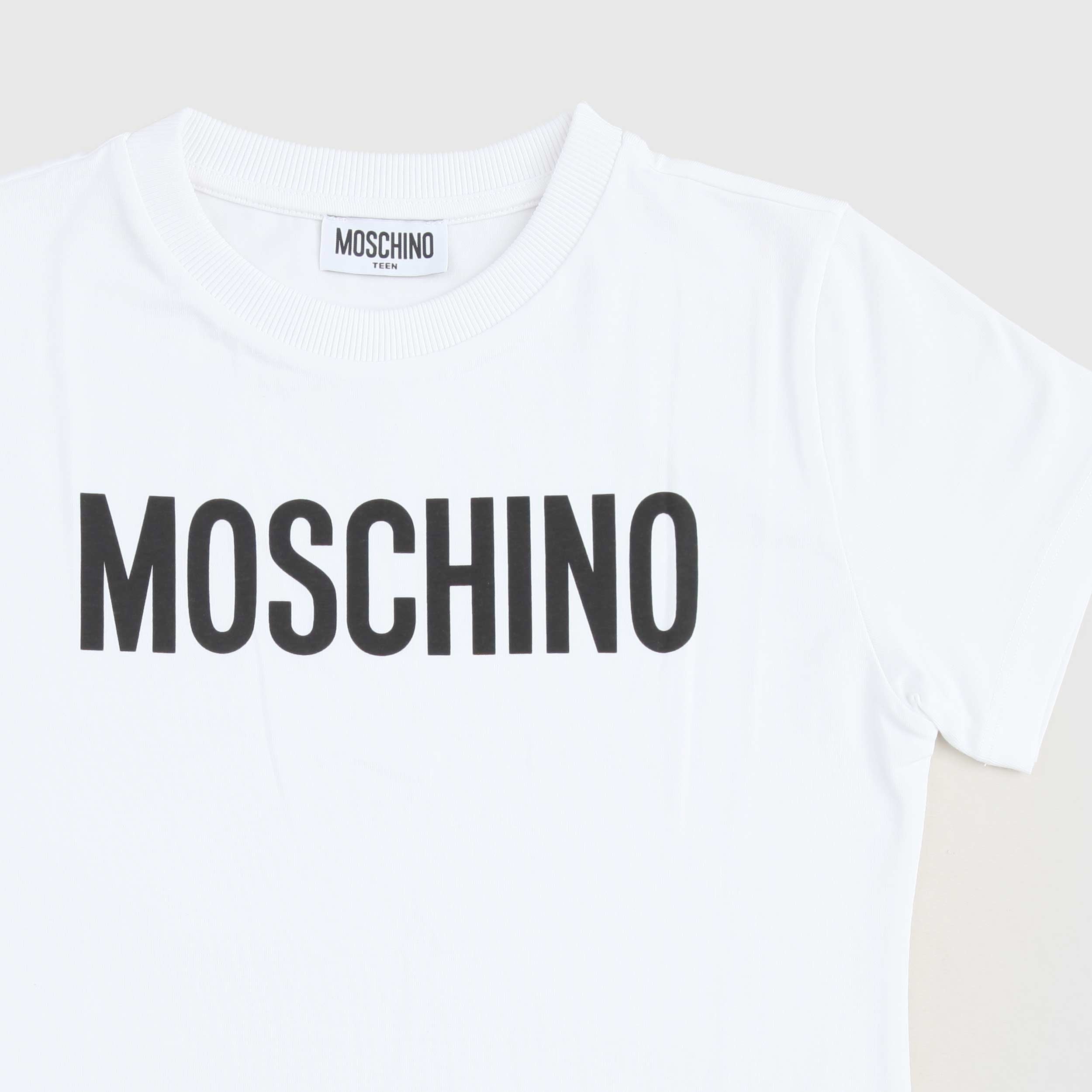 T-shirt Bianca Con Logo Nero Firmata MOSCHINO - annameglio.com abbigliamento moda