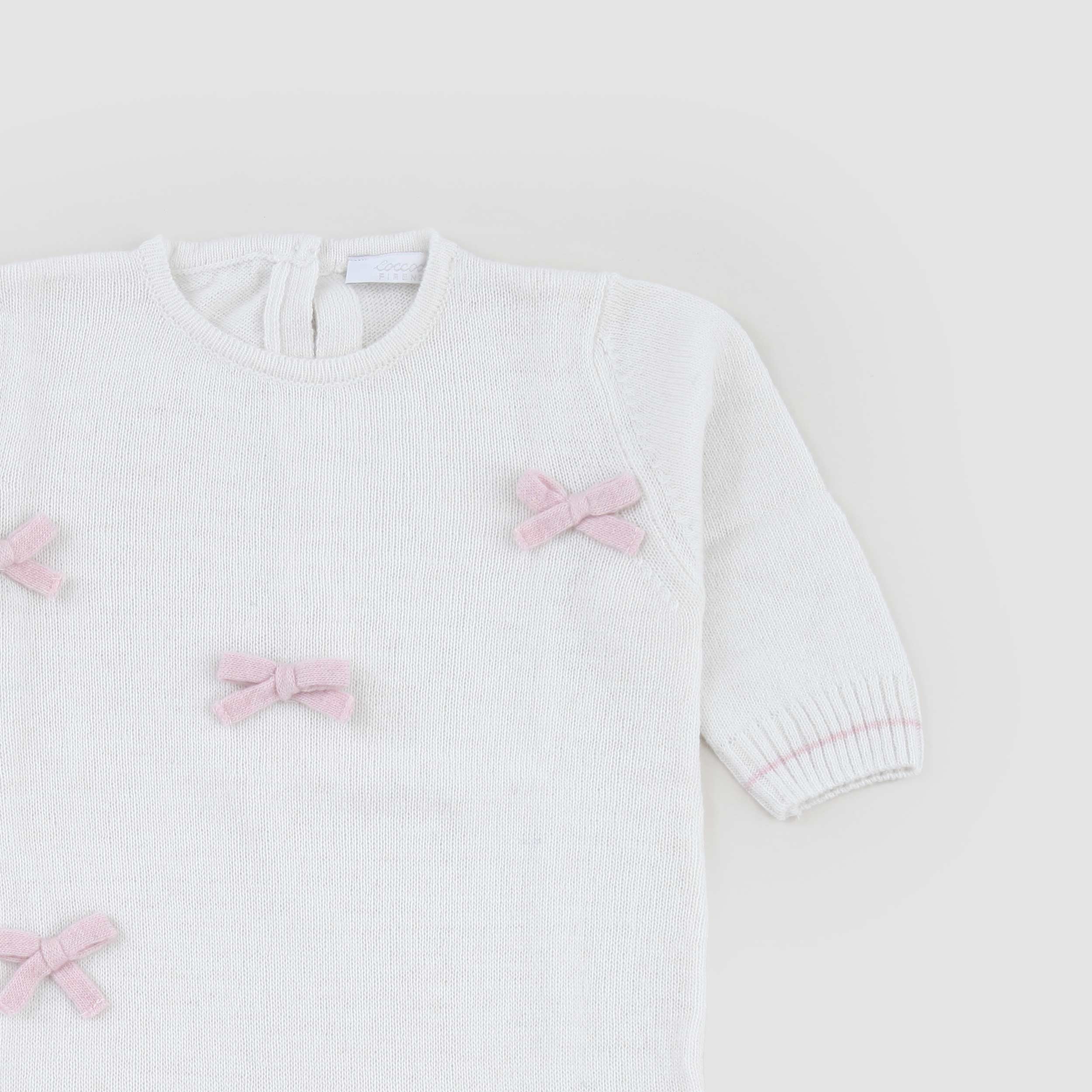 Tutina Latte E Rosa Con Fiocchi Firmata COCCODE - annameglio.com abbigliamento moda