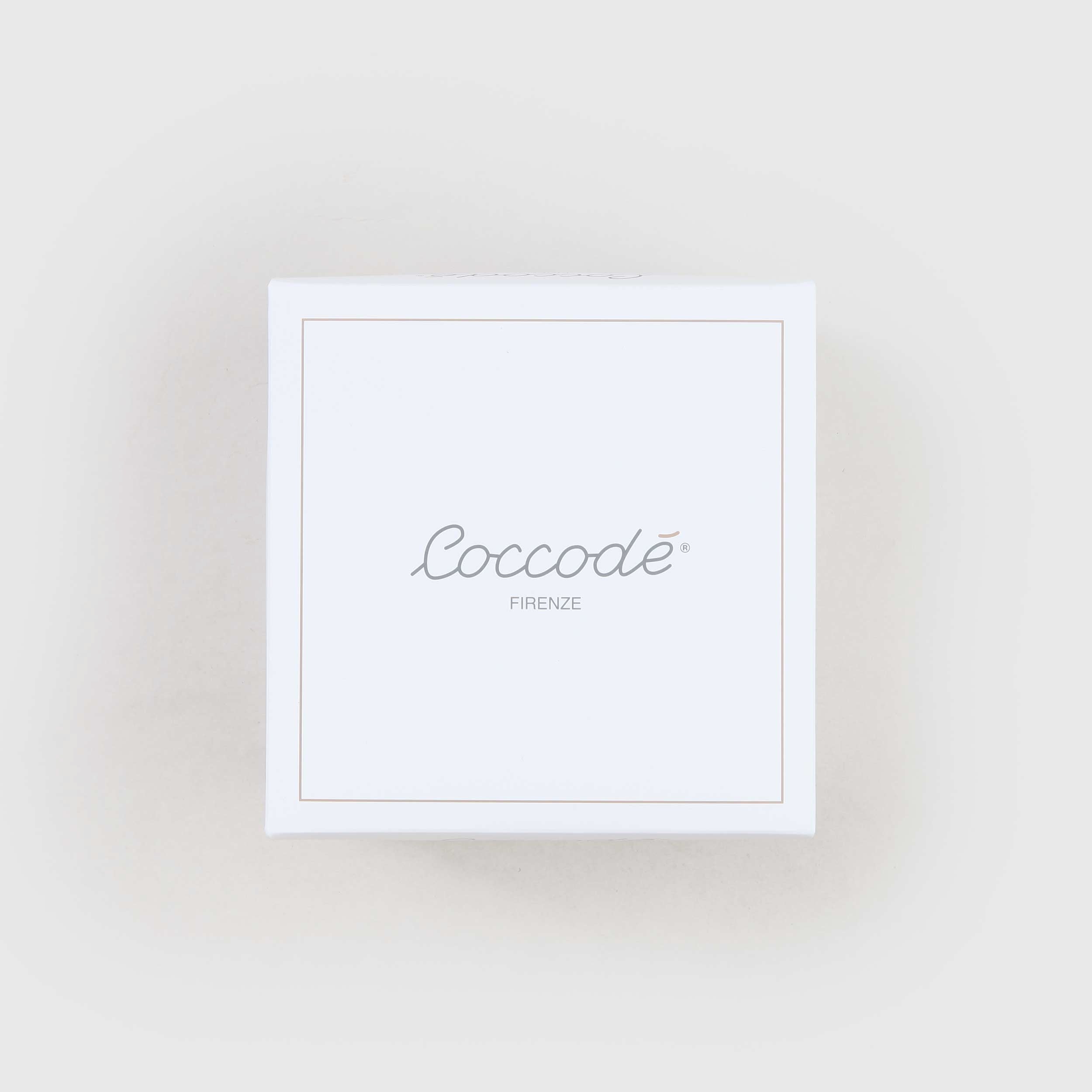 Tutina Latte Con Impunture Marroni Firmata COCCODE - annameglio.com abbigliamento moda