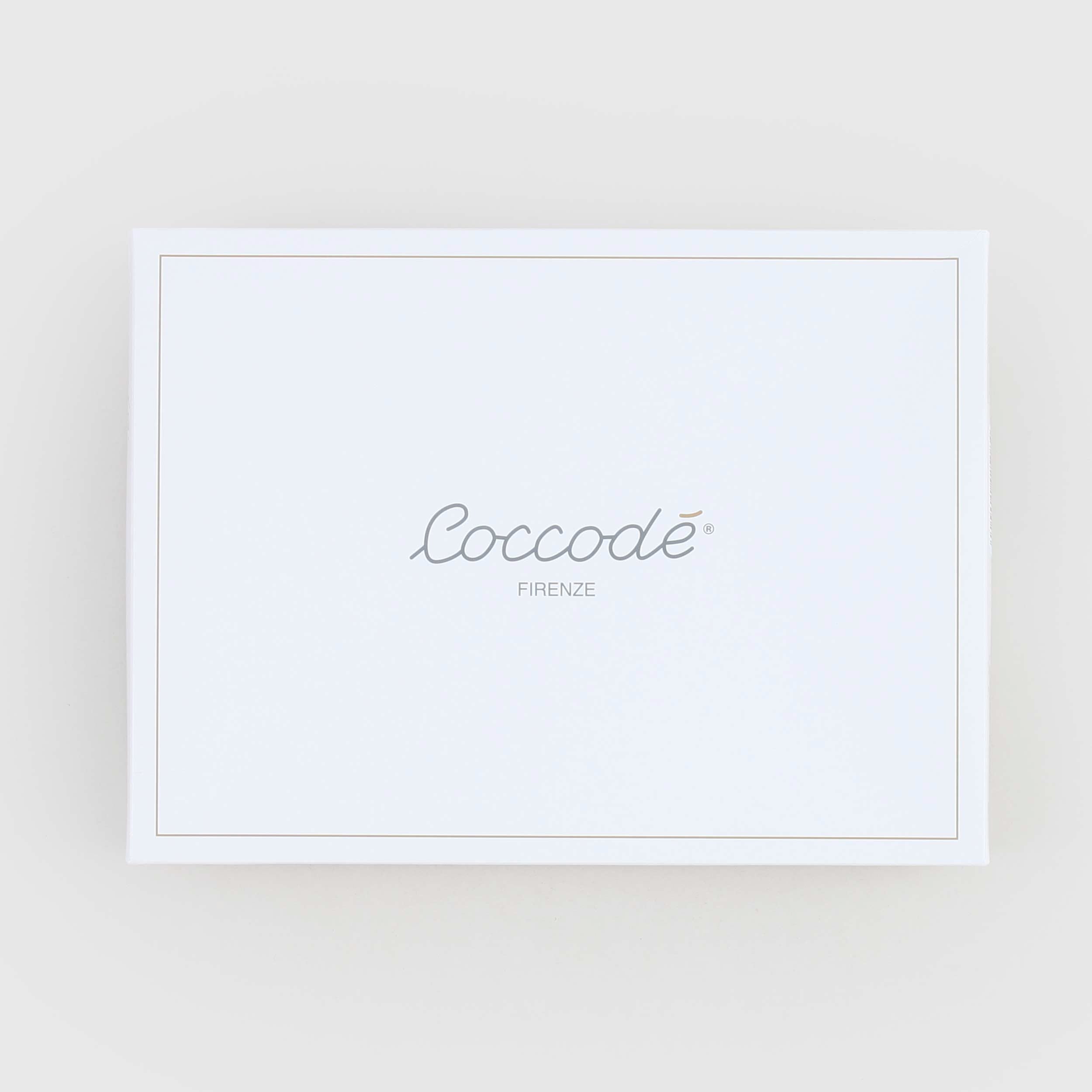 Lenzuolino Bianco E Celeste Firmato COCCODE - annameglio.com abbigliamento moda