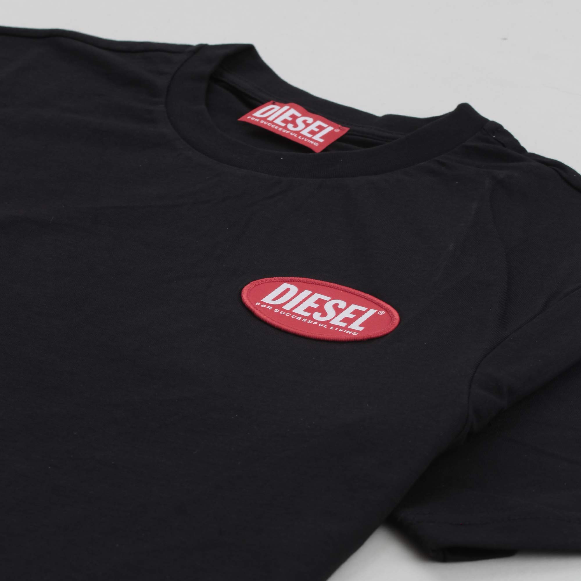 T-Shirt Nera In Jersey Logo Oval Firmata Diesel - annameglio.com abbigliamento moda