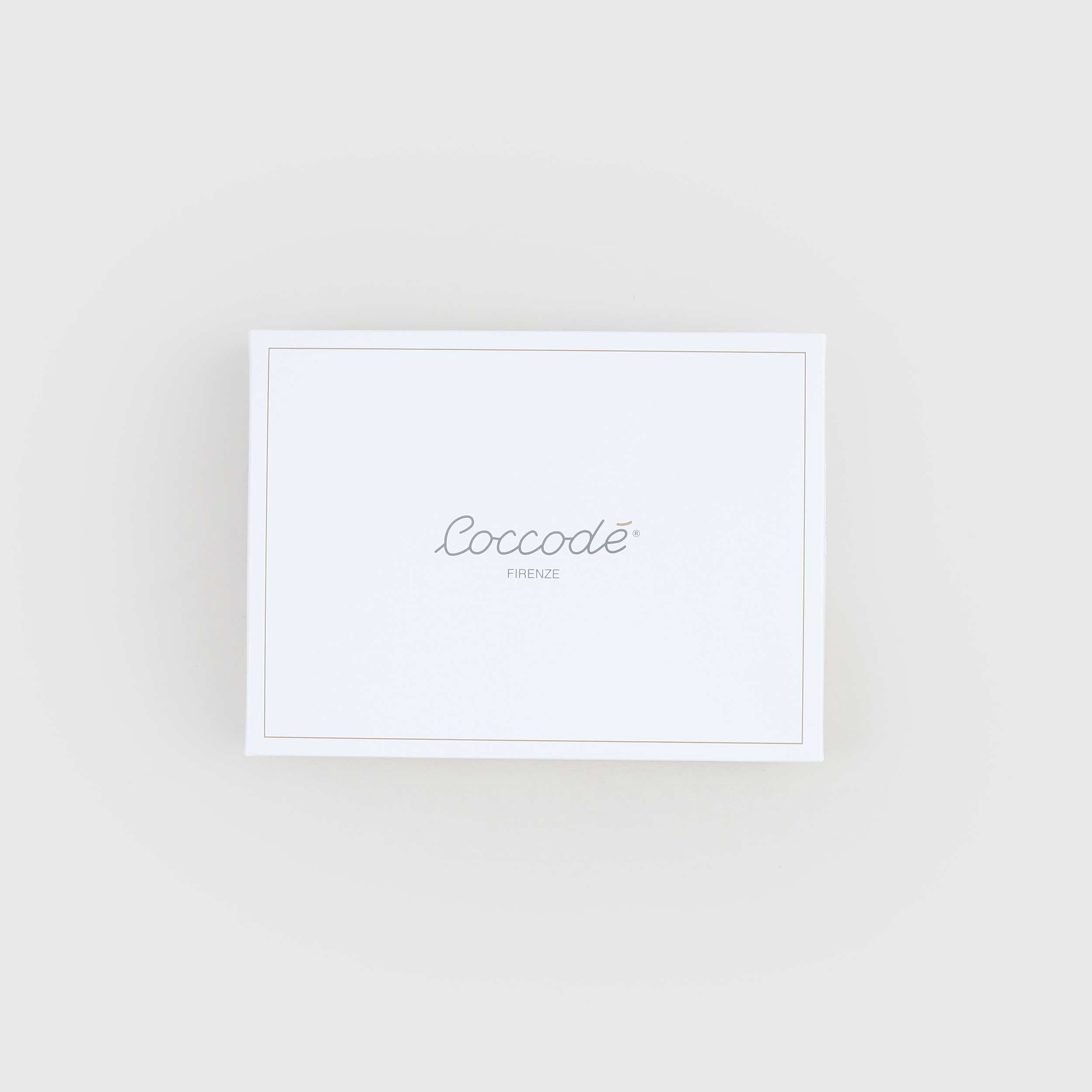 Lenzuolino Bianco Tre Pezzi Firmato COCCODE - annameglio.com abbigliamento moda