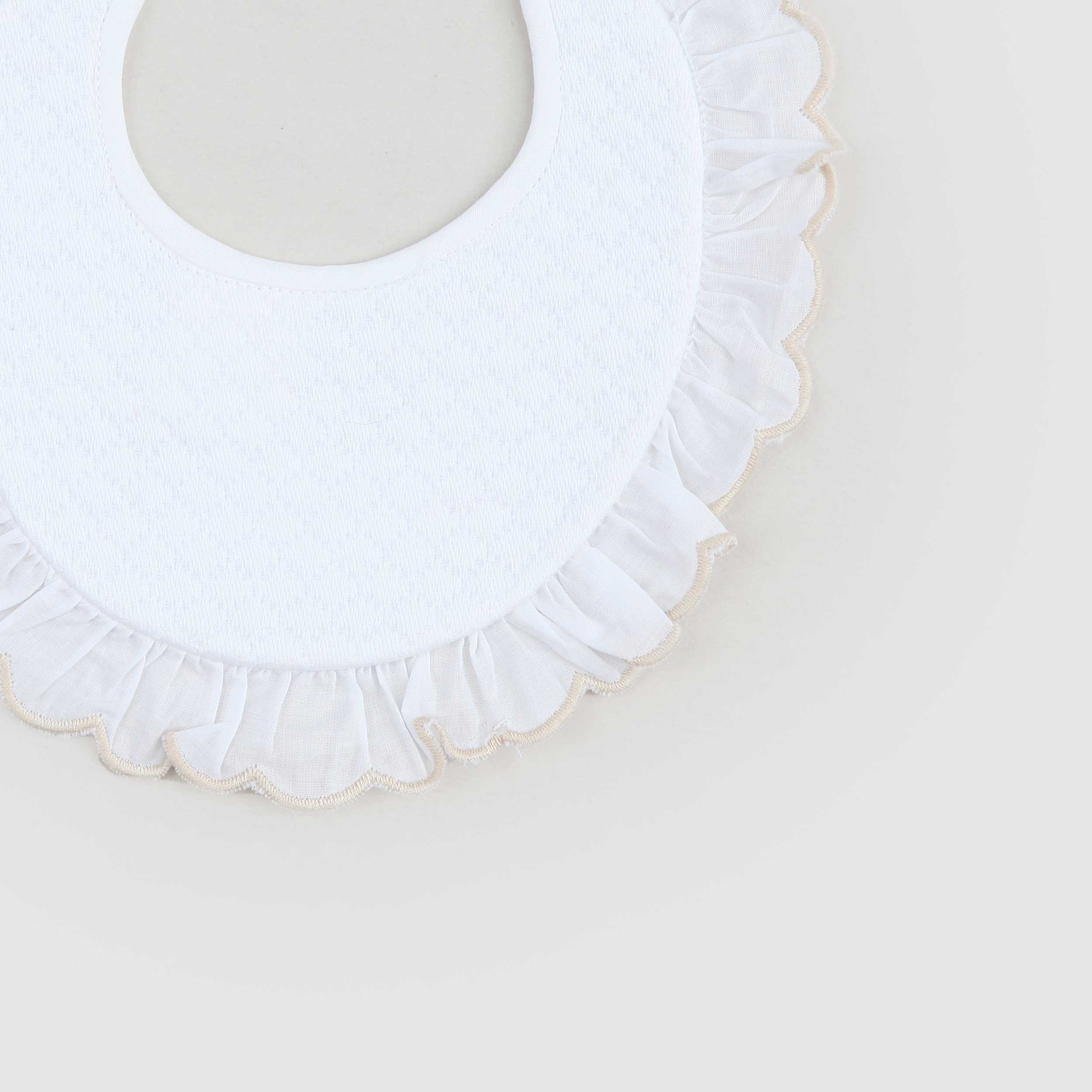 White bib with embroidery signed BARONI