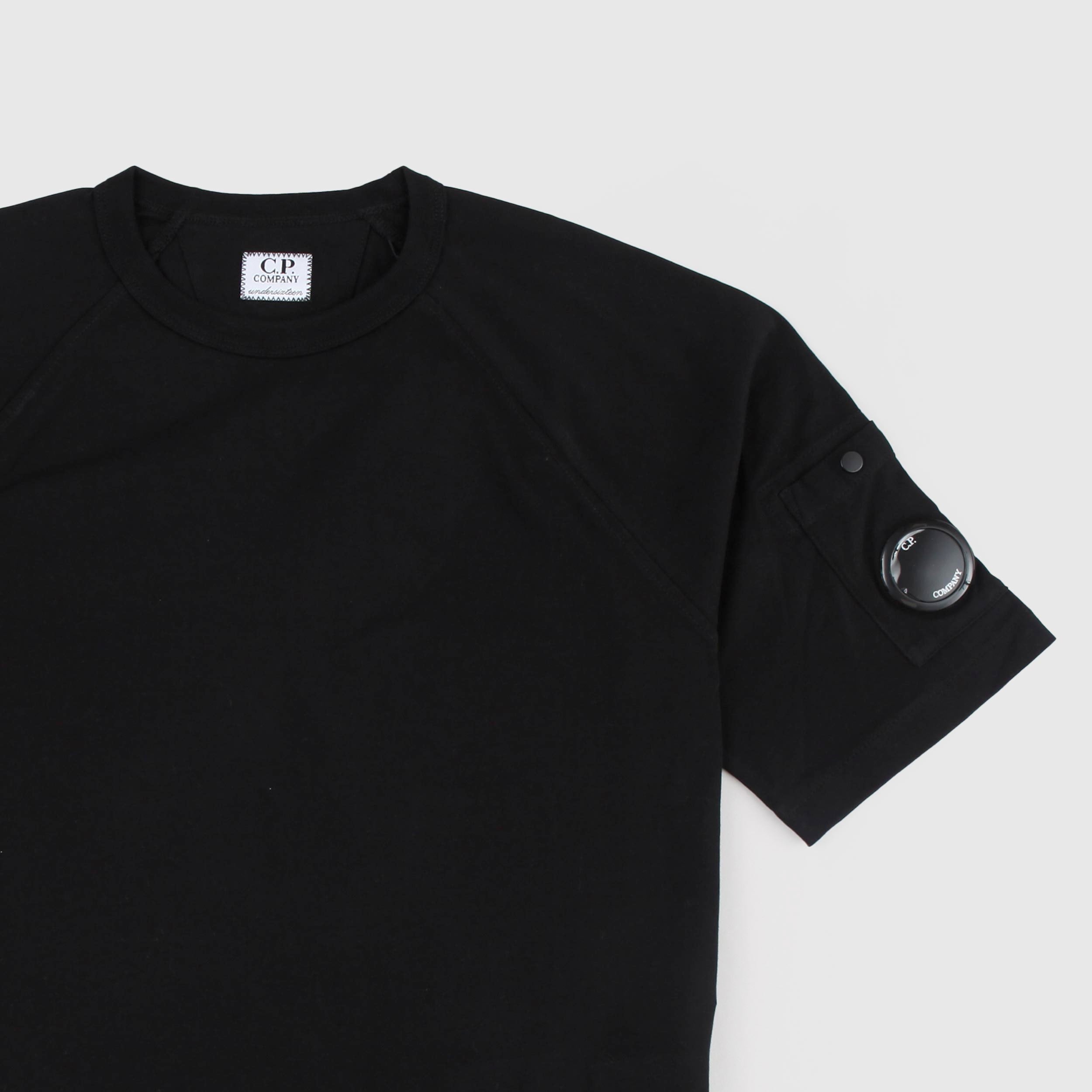 Black T-shirt with iconic lens by CP COMPANY