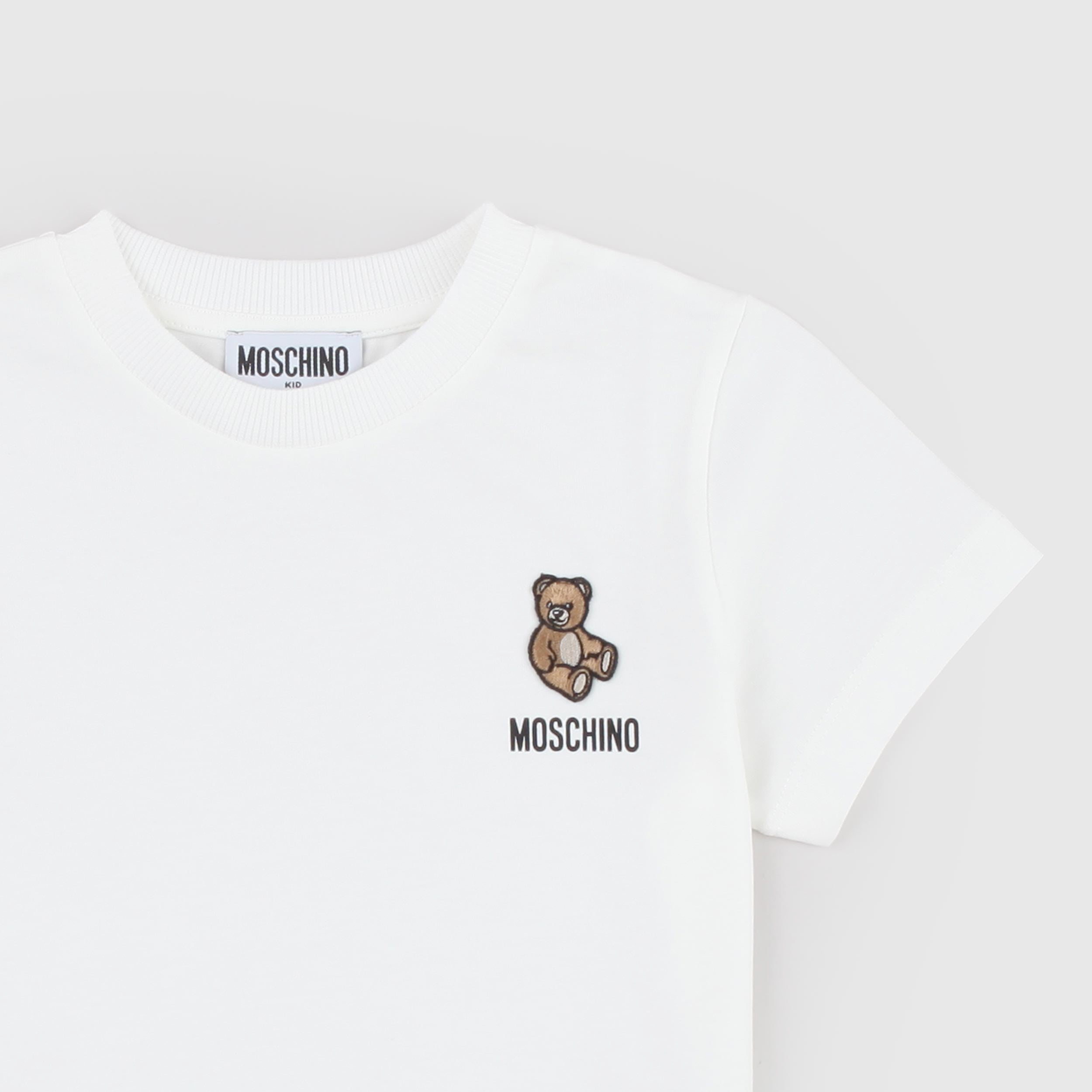 White T-shirt with a MOSCHINO tag on the left side