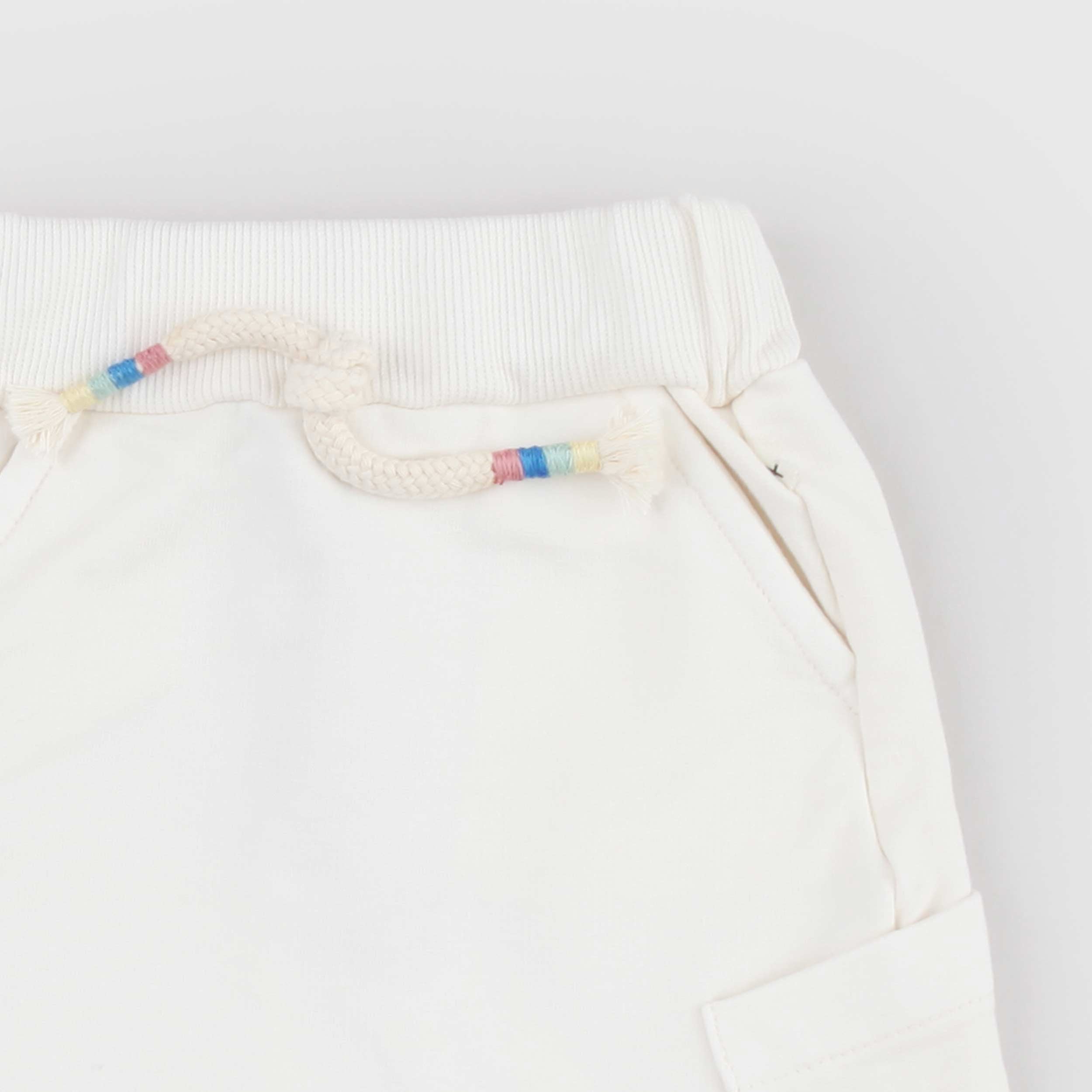 Trousers with Slanted Pockets by ONE MORE IN THE FAMILY