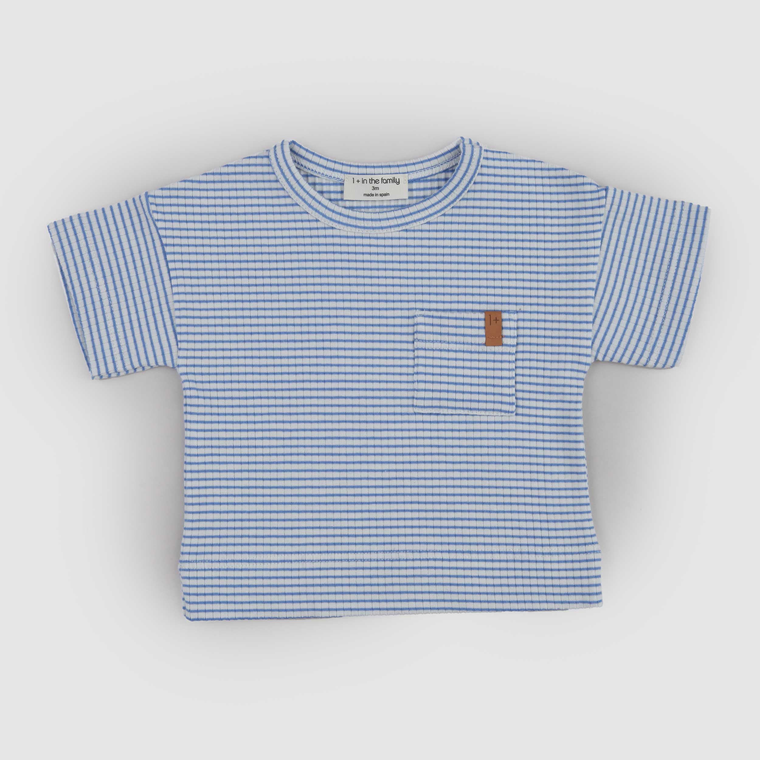 T-shirt Bianca e Celeste con Targhetta Marrone Firmata ONE MORE IN THE FAMILY