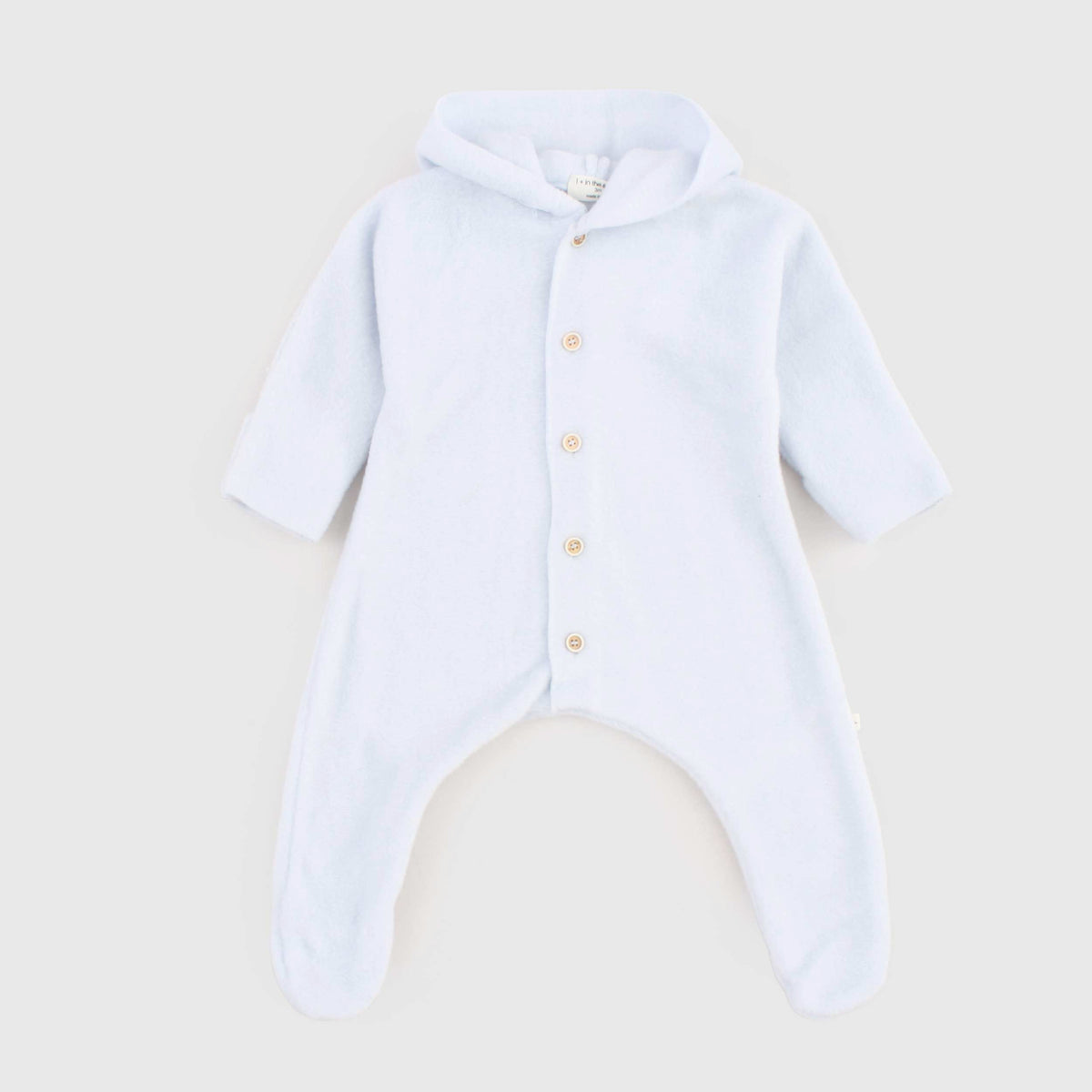 Light blue Baby Footed onesie by ONE MORE IN THE FAMILY