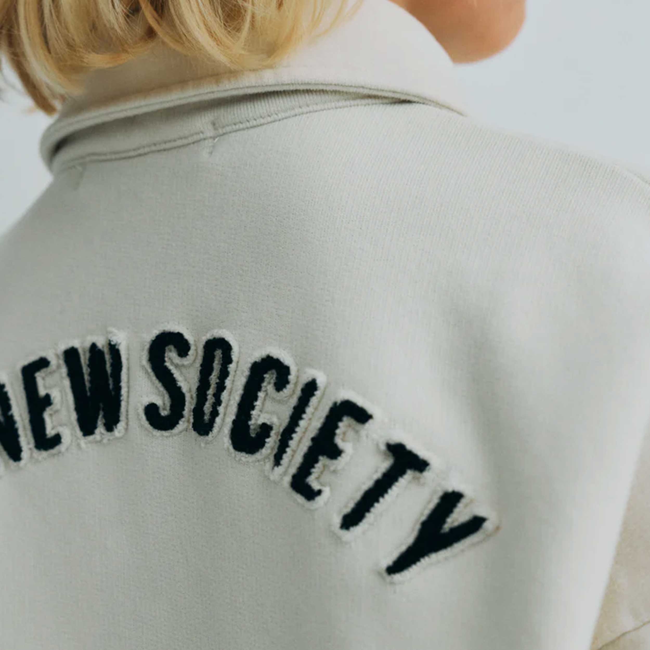 Felpa Modello Polo Bianca Firmata THE NEW SOCIETY