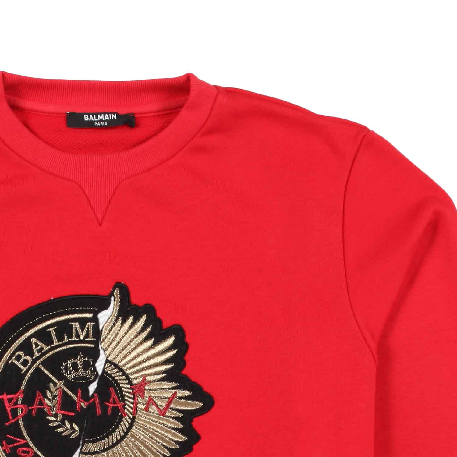 FELPA ROSSA CON PATCH NERA E ORO - annameglio.com abbigliamento moda