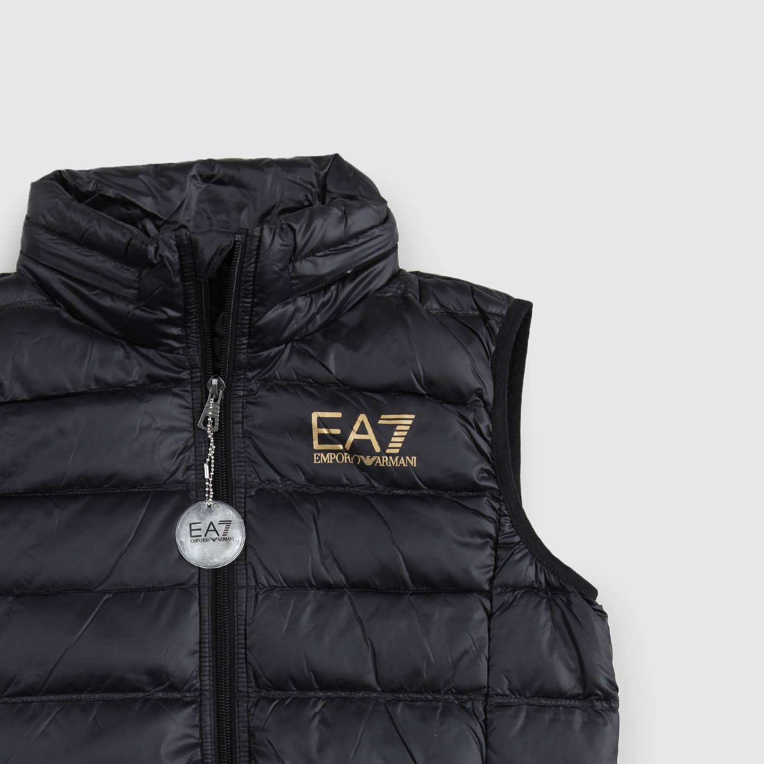 PIUMINO GILET NERO CON LOGO EA7 ORO - annameglio.com abbigliamento moda