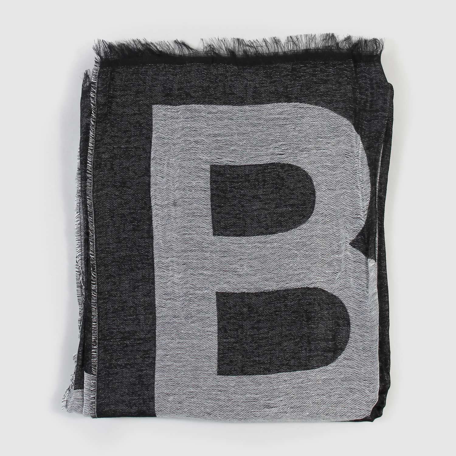 Sciarpa bianca e nera con profili sfrangiati - annameglio.com abbigliamento moda