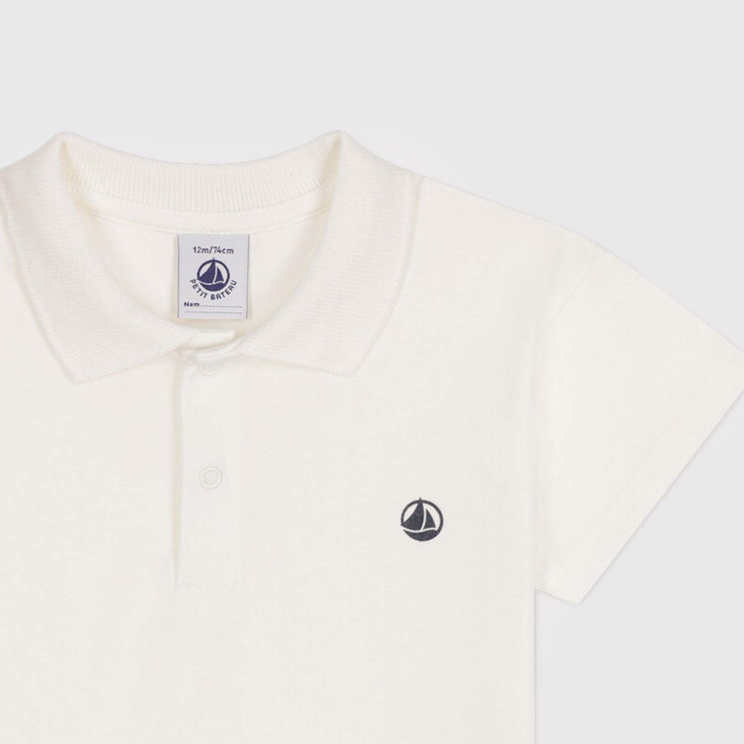 t-shirt polo bianca con stampa logo bambino - annameglio.com abbigliamento moda