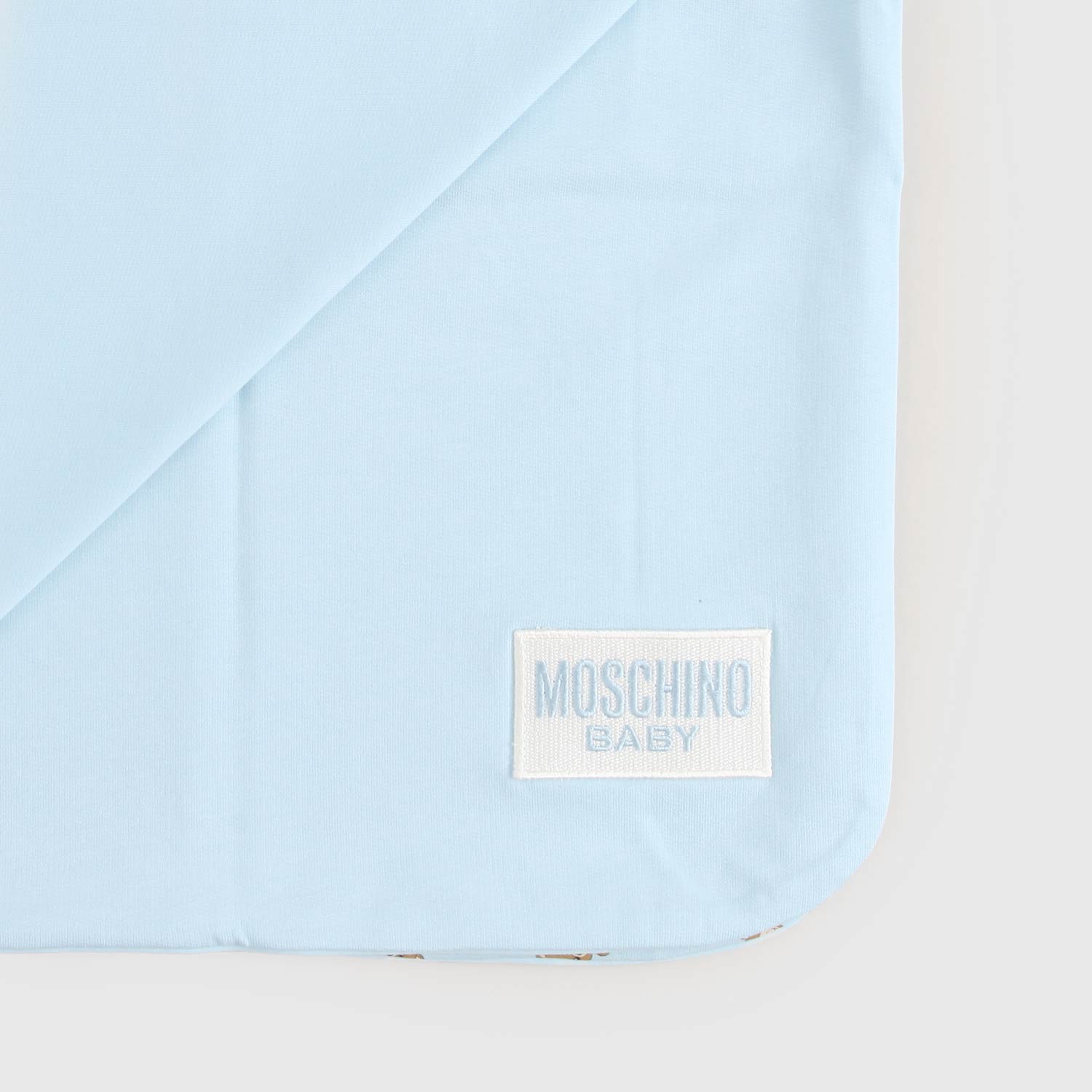 Coperta Celeste All-Over Moschino - annameglio.com abbigliamento moda