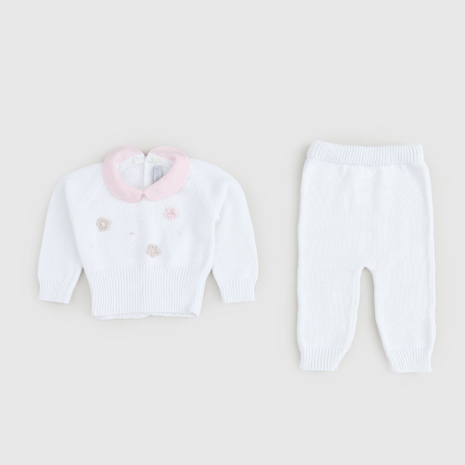 Completino bianco con ricamo a fiori - annameglio.com abbigliamento moda