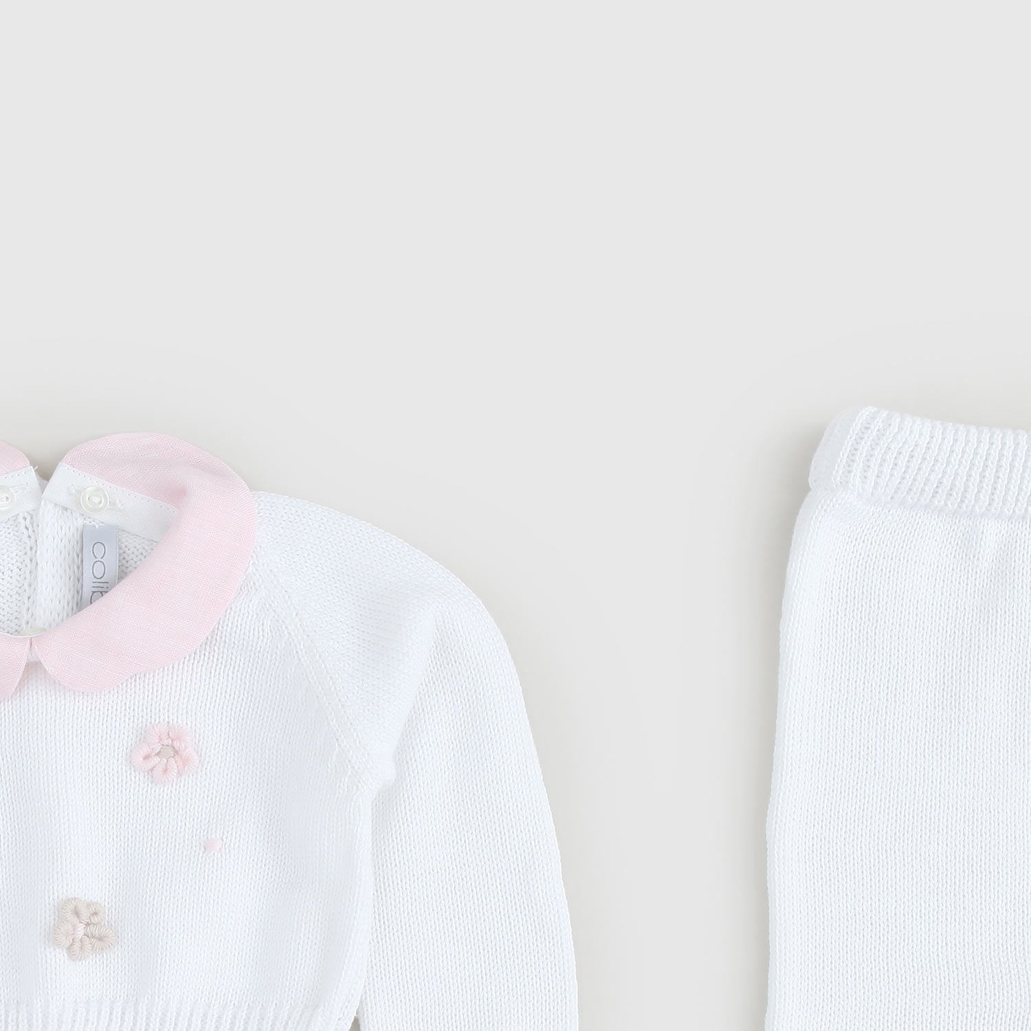 Completino bianco con ricamo a fiori - annameglio.com abbigliamento moda