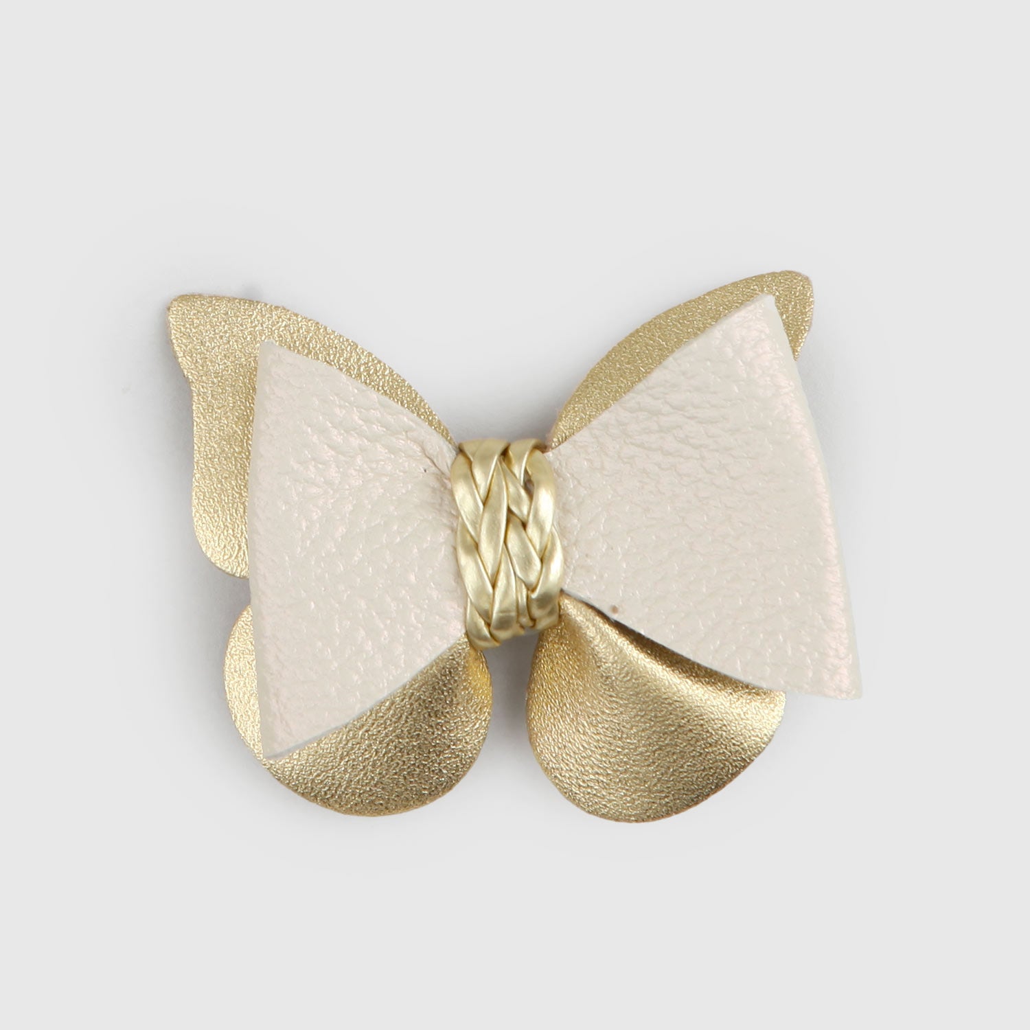 Fermaglio fiocco dorato in pelle - annameglio.com abbigliamento moda
