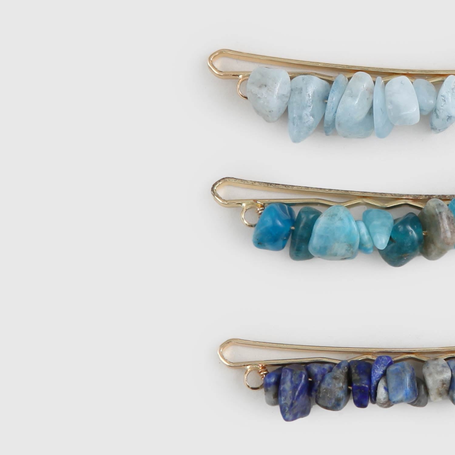 Tris fermagli con pietre azzurre - annameglio.com abbigliamento moda