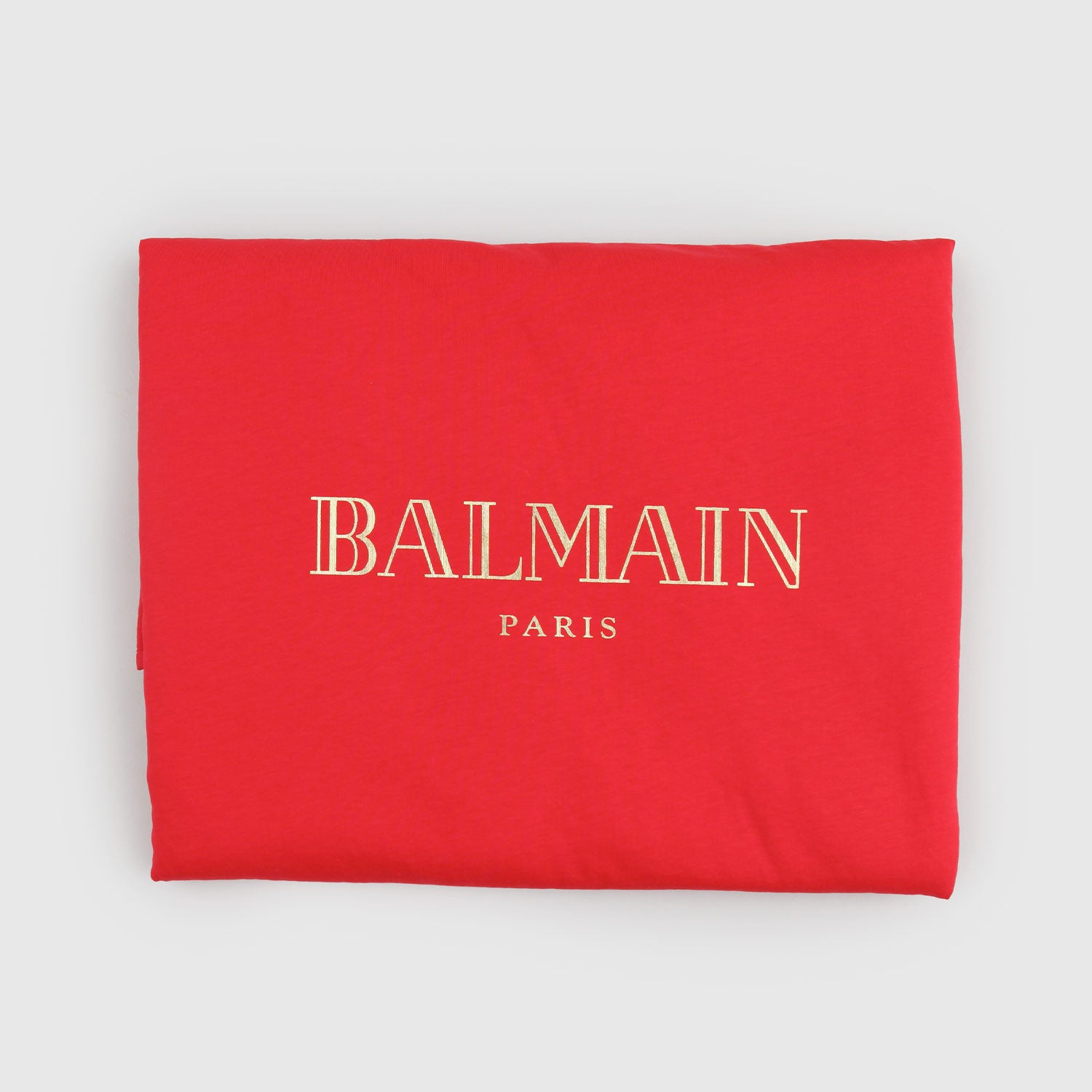 Coperta Balmain rossa con logo oro - annameglio.com abbigliamento moda