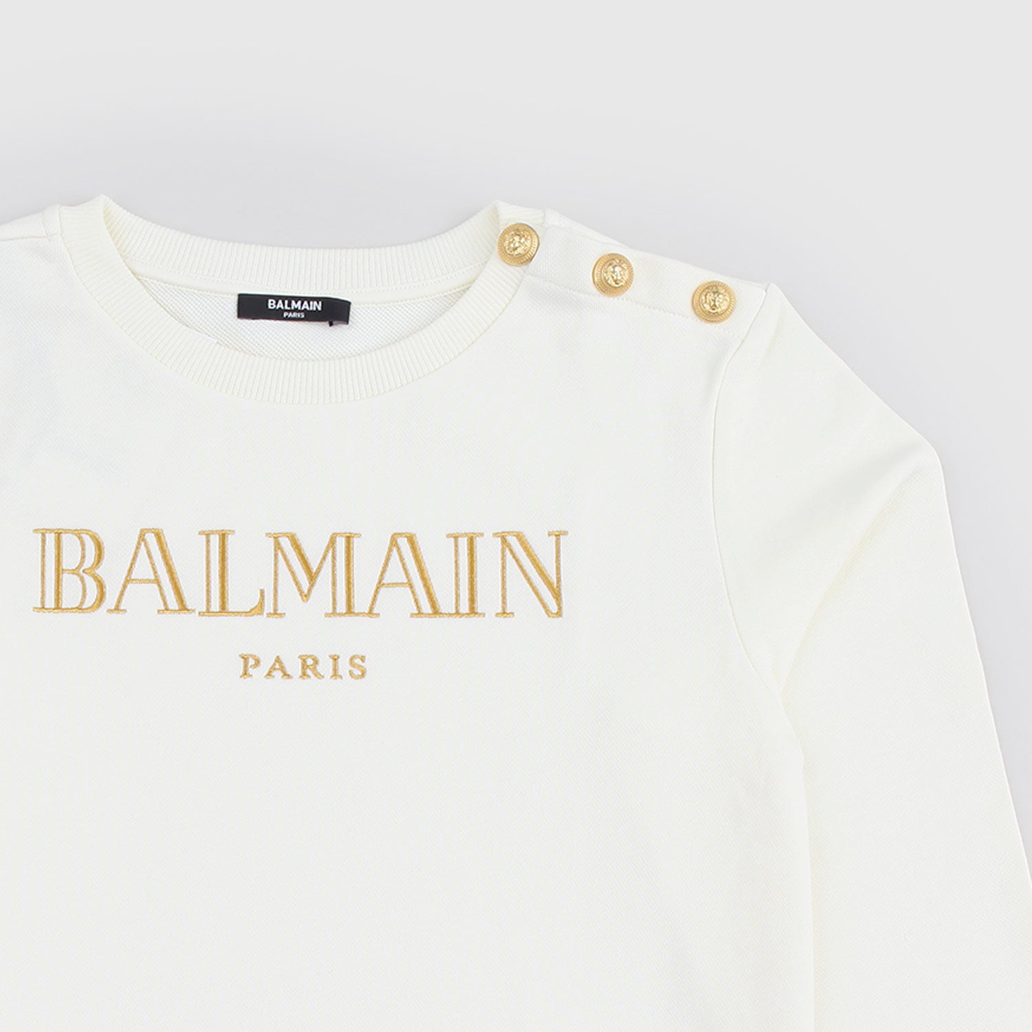 Felpa beige con logo e bottoncini d’oro - annameglio.com abbigliamento moda