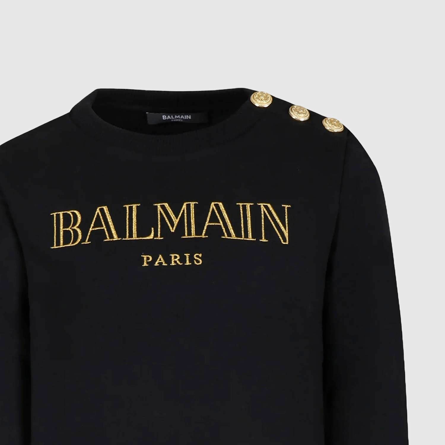 Felpa nera con logo d’oro e bottoni dorati - annameglio.com abbigliamento moda